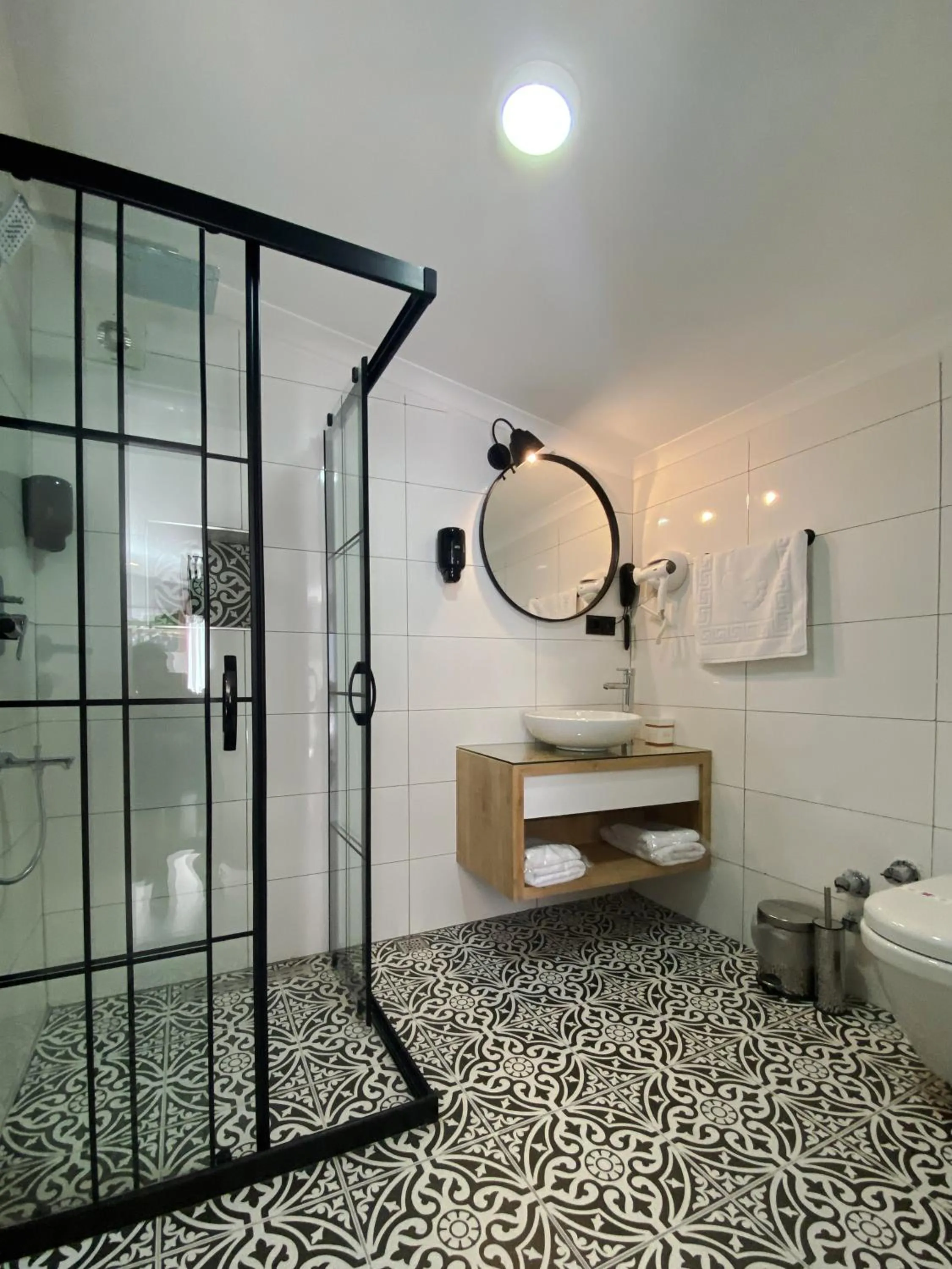 Bathroom in L'opera Deluxe Hotel