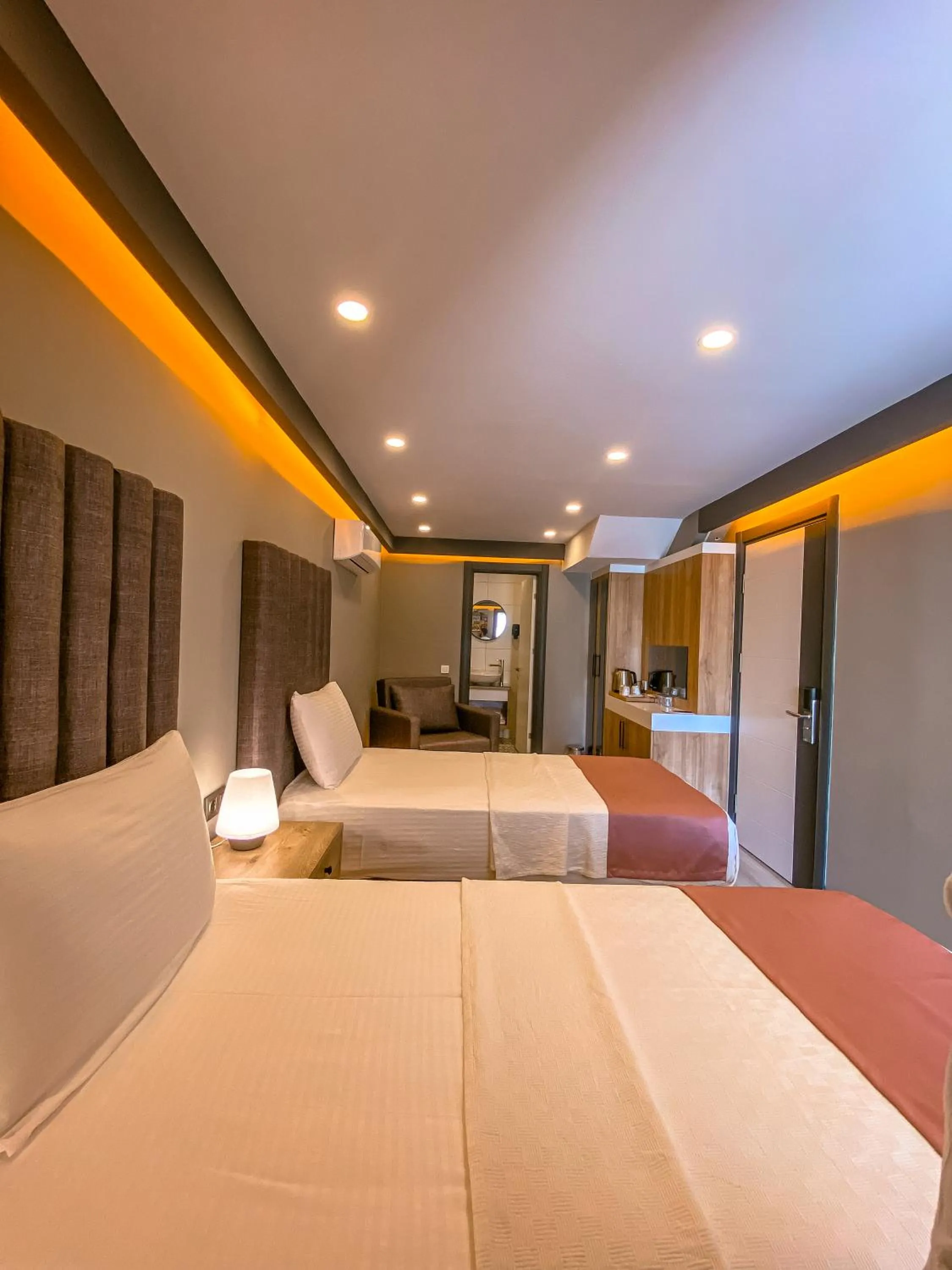 Bed in L'opera Deluxe Hotel