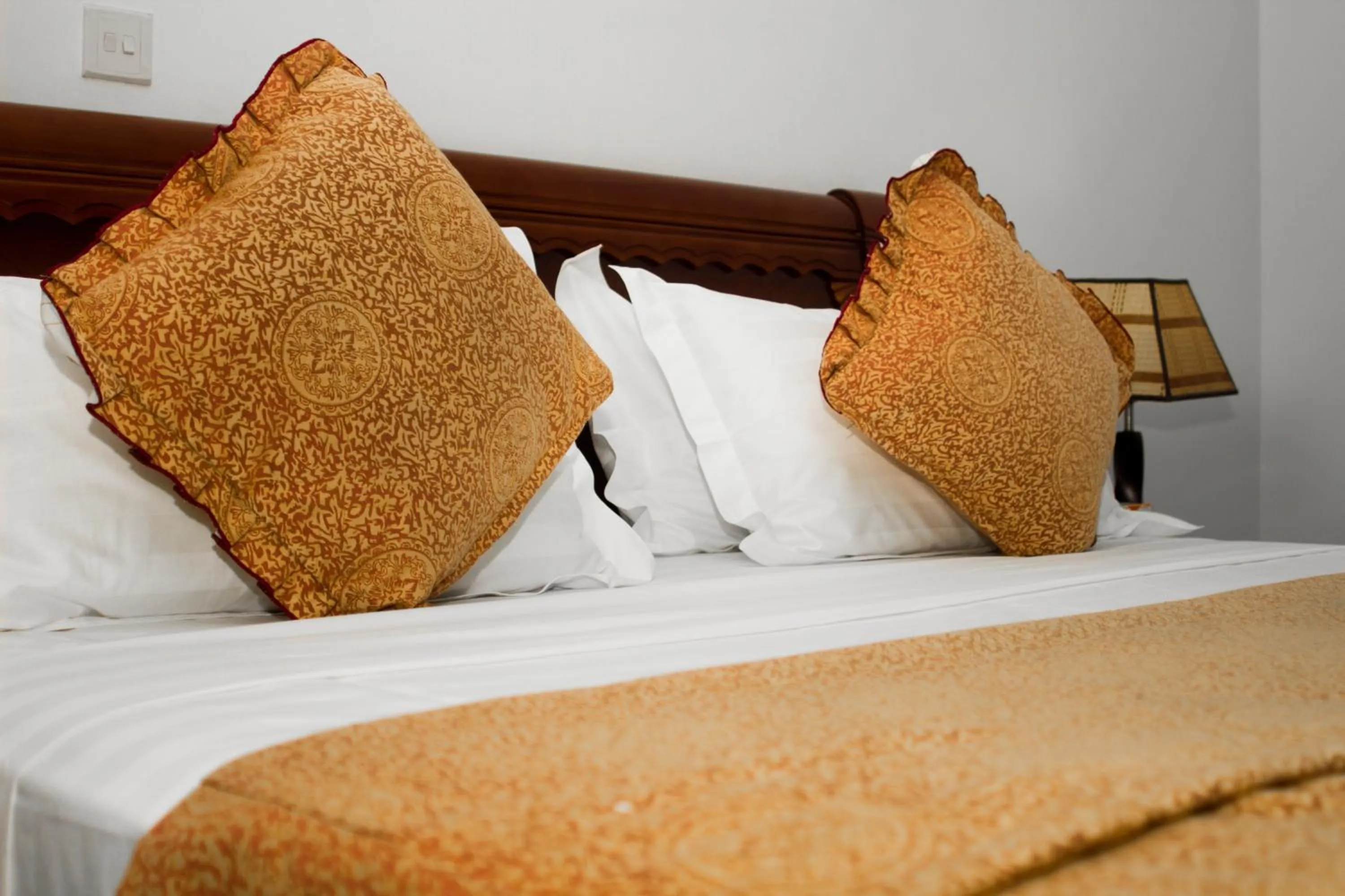 Bed in MJ Grand Hotel