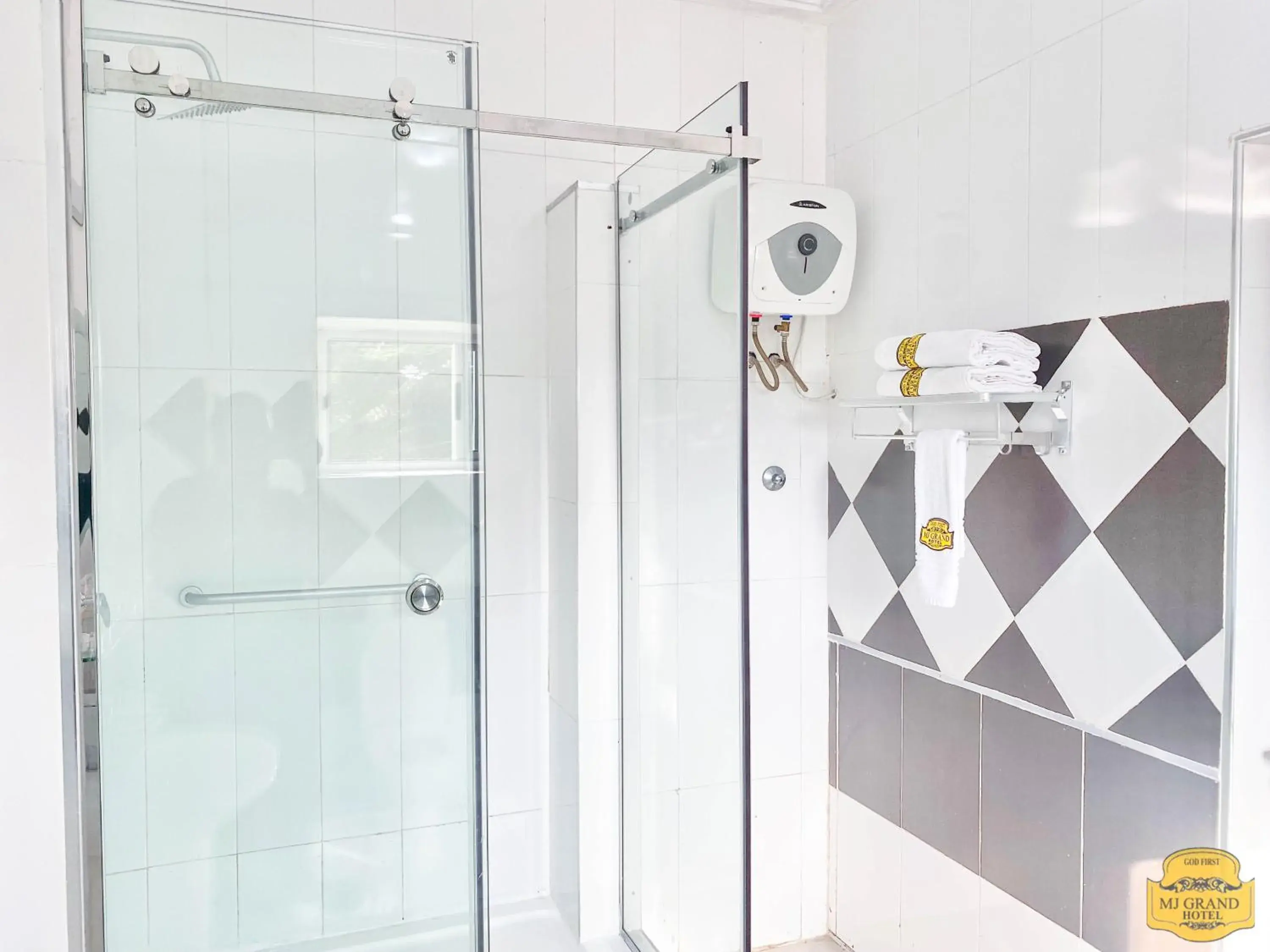 Bathroom in MJ Grand Hotel Bathroom in MJ Grand Hotel