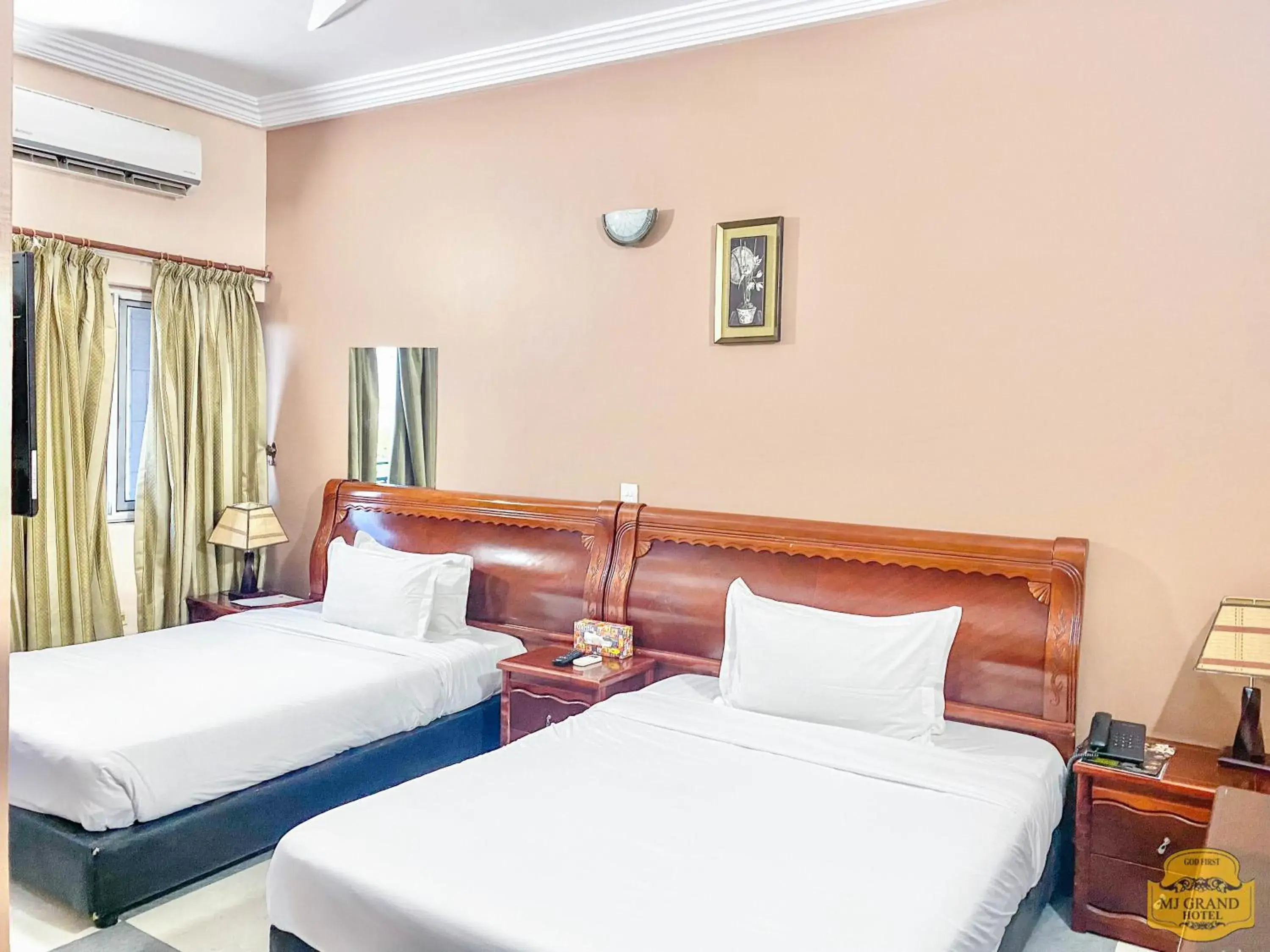 Photo of the whole room, Bed in MJ Grand Hotel Photo of the whole room, Bed in MJ Grand Hotel