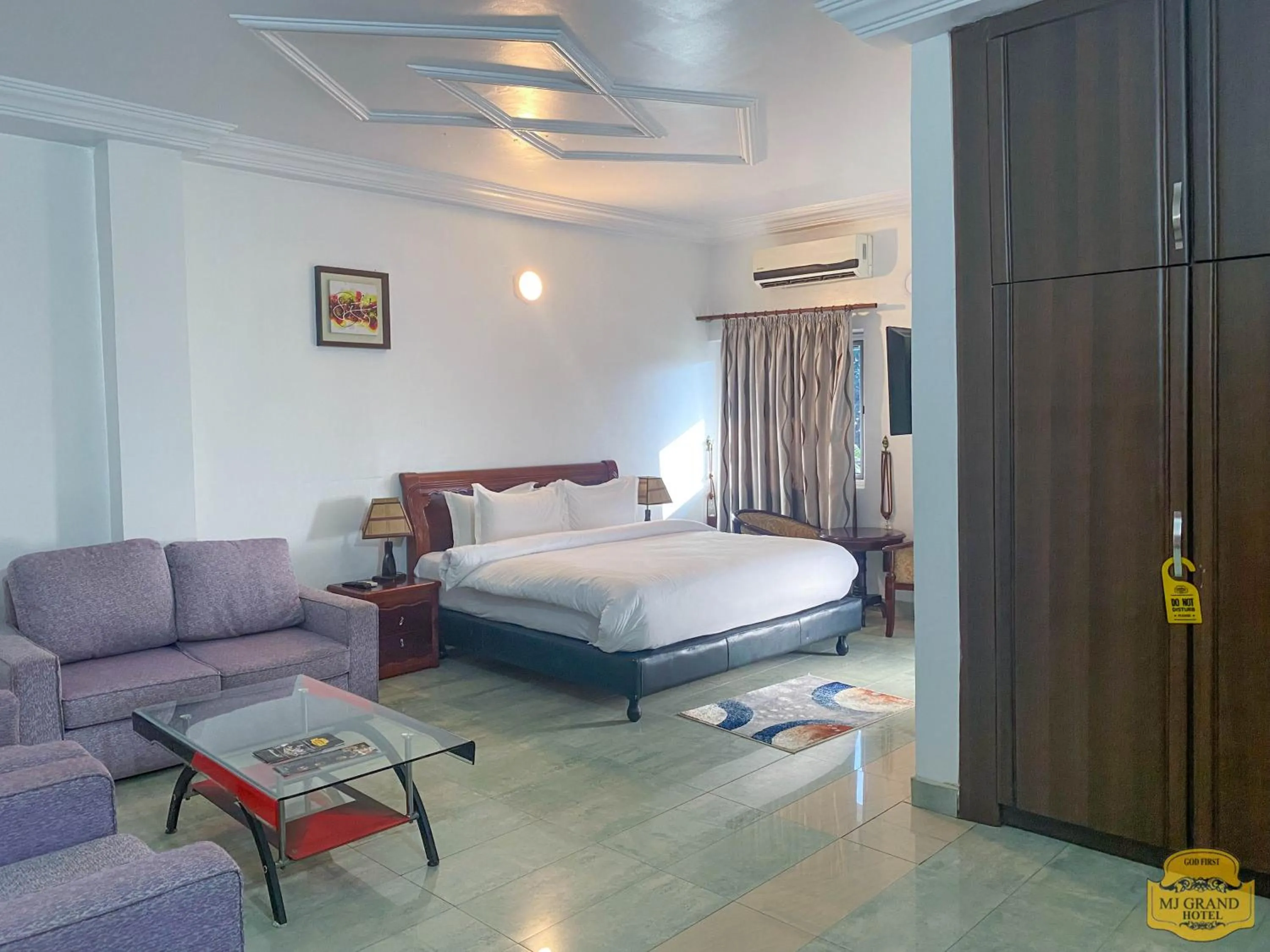 Photo of the whole room, Bed in MJ Grand Hotel