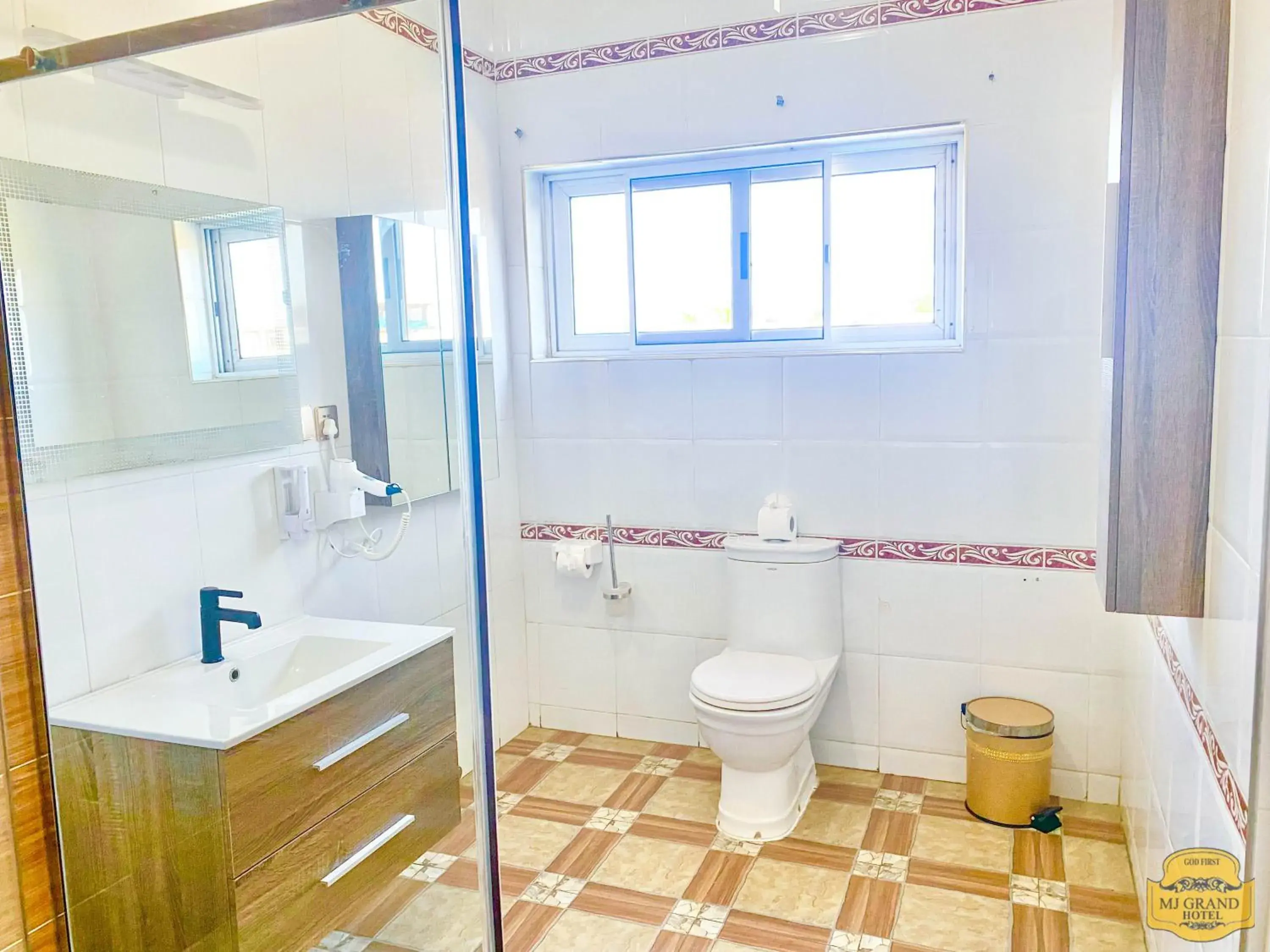 Bathroom in MJ Grand Hotel Bathroom in MJ Grand Hotel