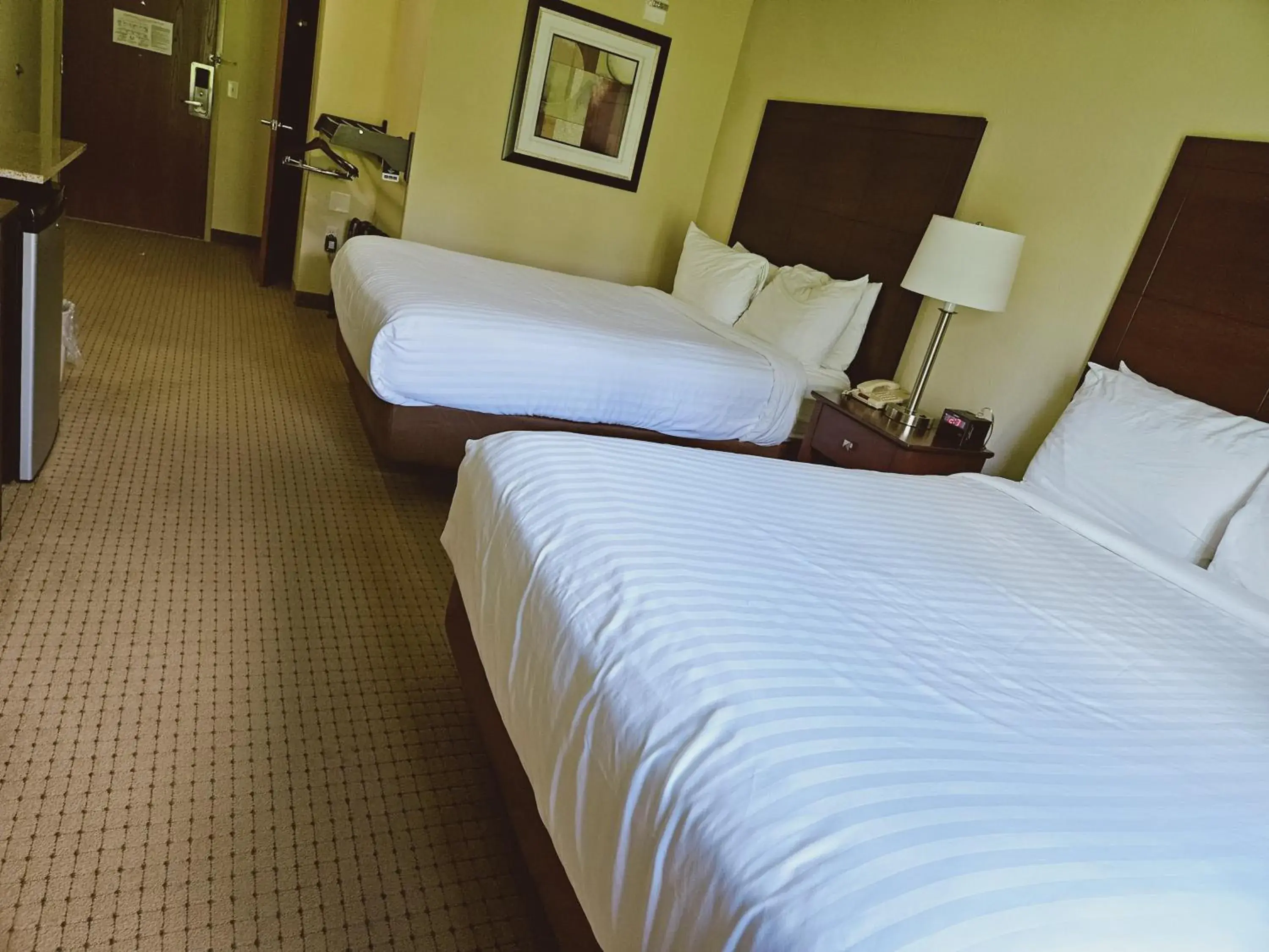 Bedroom, Bed in Cobblestone Inn & Suites - Bloomfield Bedroom, Bed in Cobblestone Inn & Suites - Bloomfield