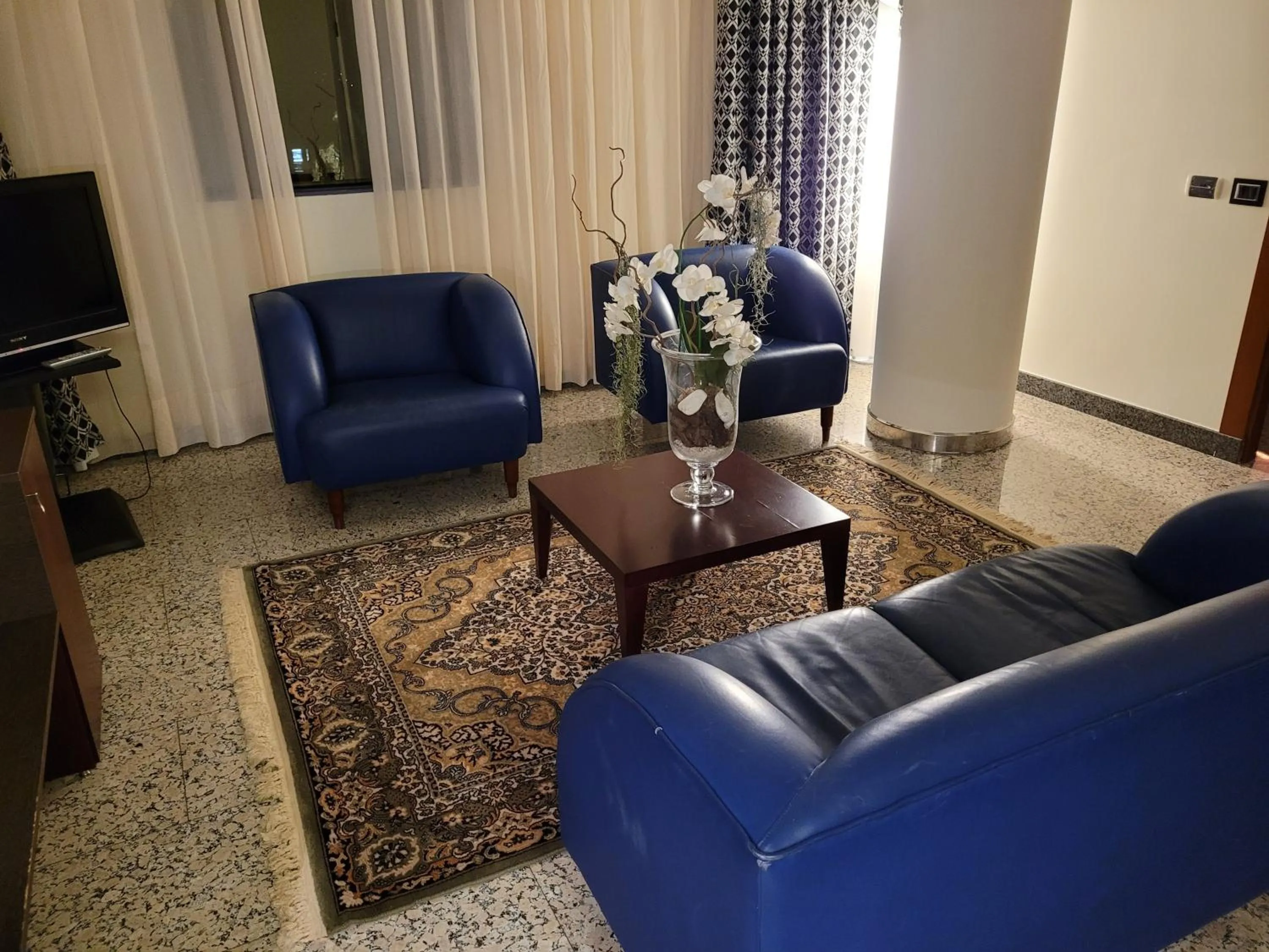 Living room in Hotel Amaltea by Executive Sport