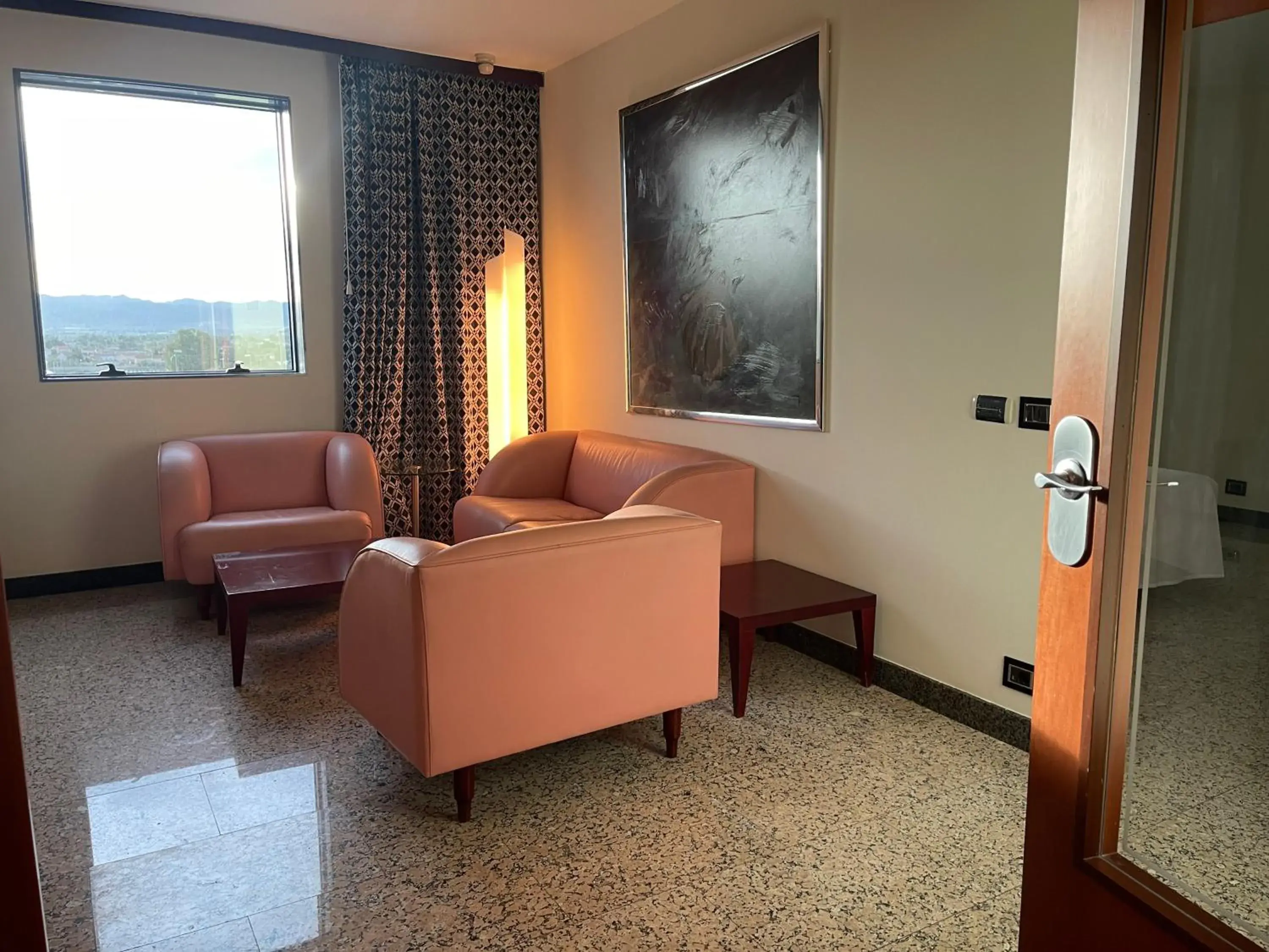 Living room in Hotel Amaltea by Executive Sport Living room in Hotel Amaltea by Executive Sport