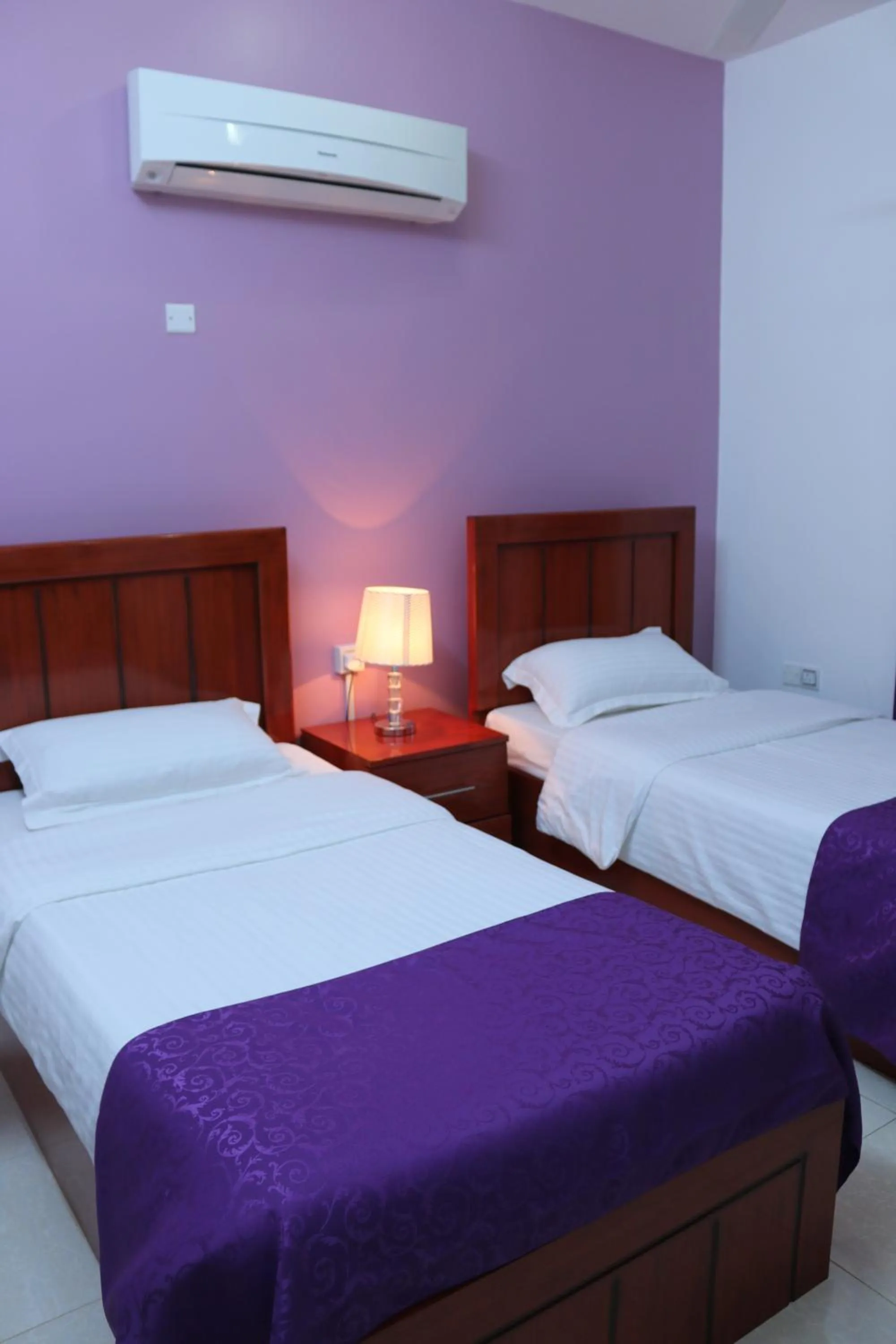 Bed in Al Karam Hotel Apartment