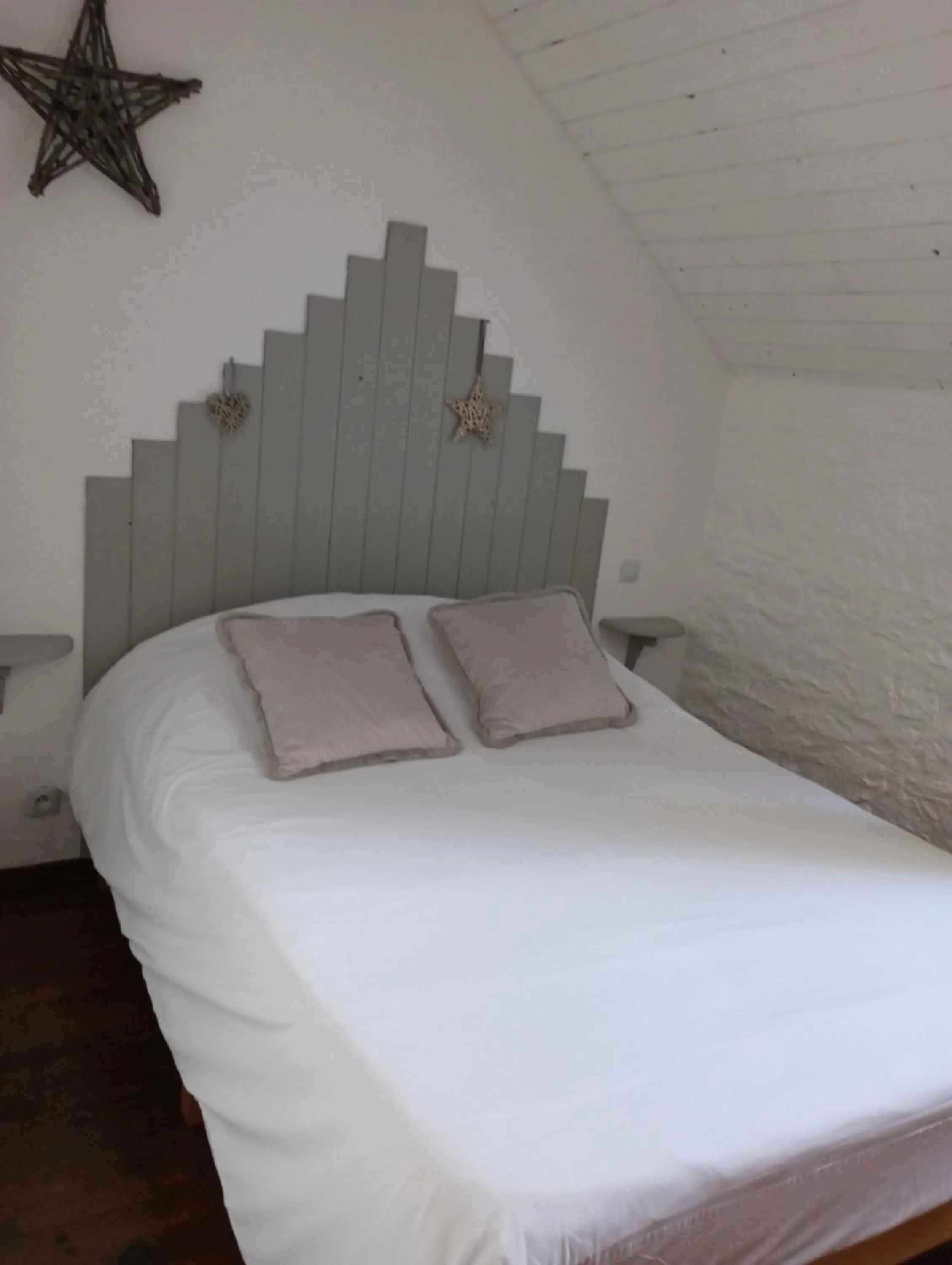Bed in Les gîtes du petit Marcel
