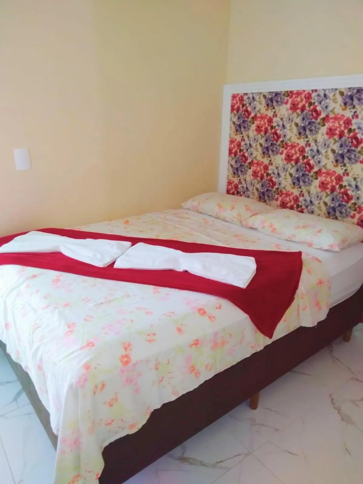 Bed in Pousada Cavalero