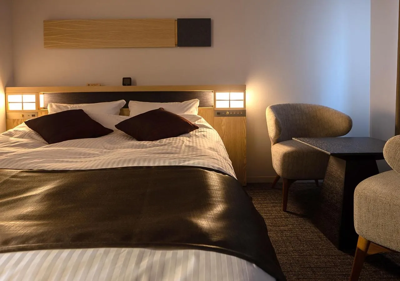 Bed in Hotel Grand Cocoe Kurashiki