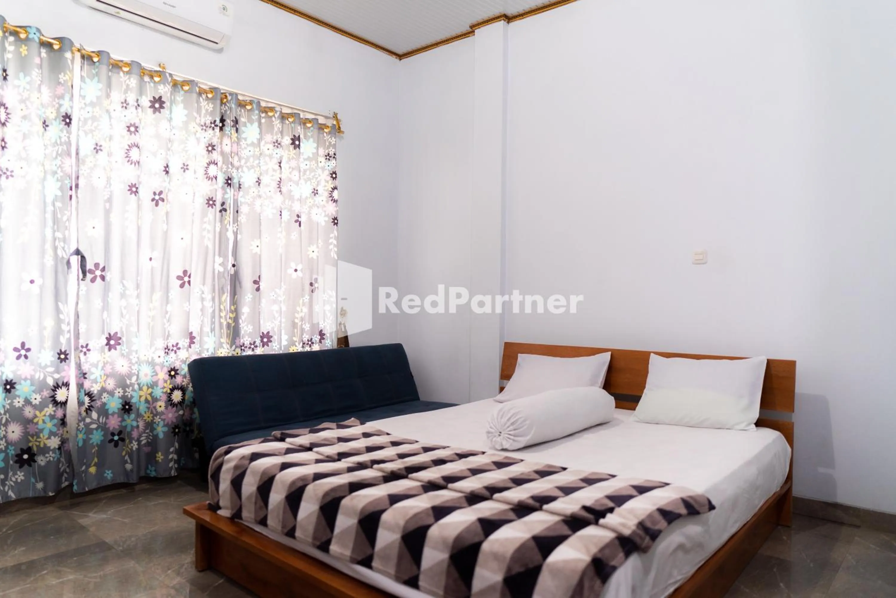 Bedroom in ITR Homestay RedPartner