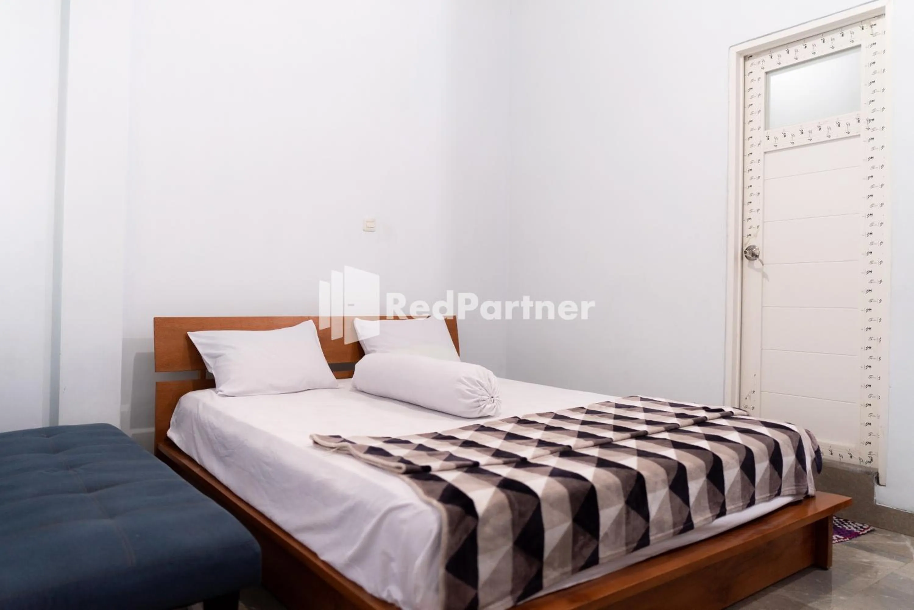 Bedroom in ITR Homestay RedPartner