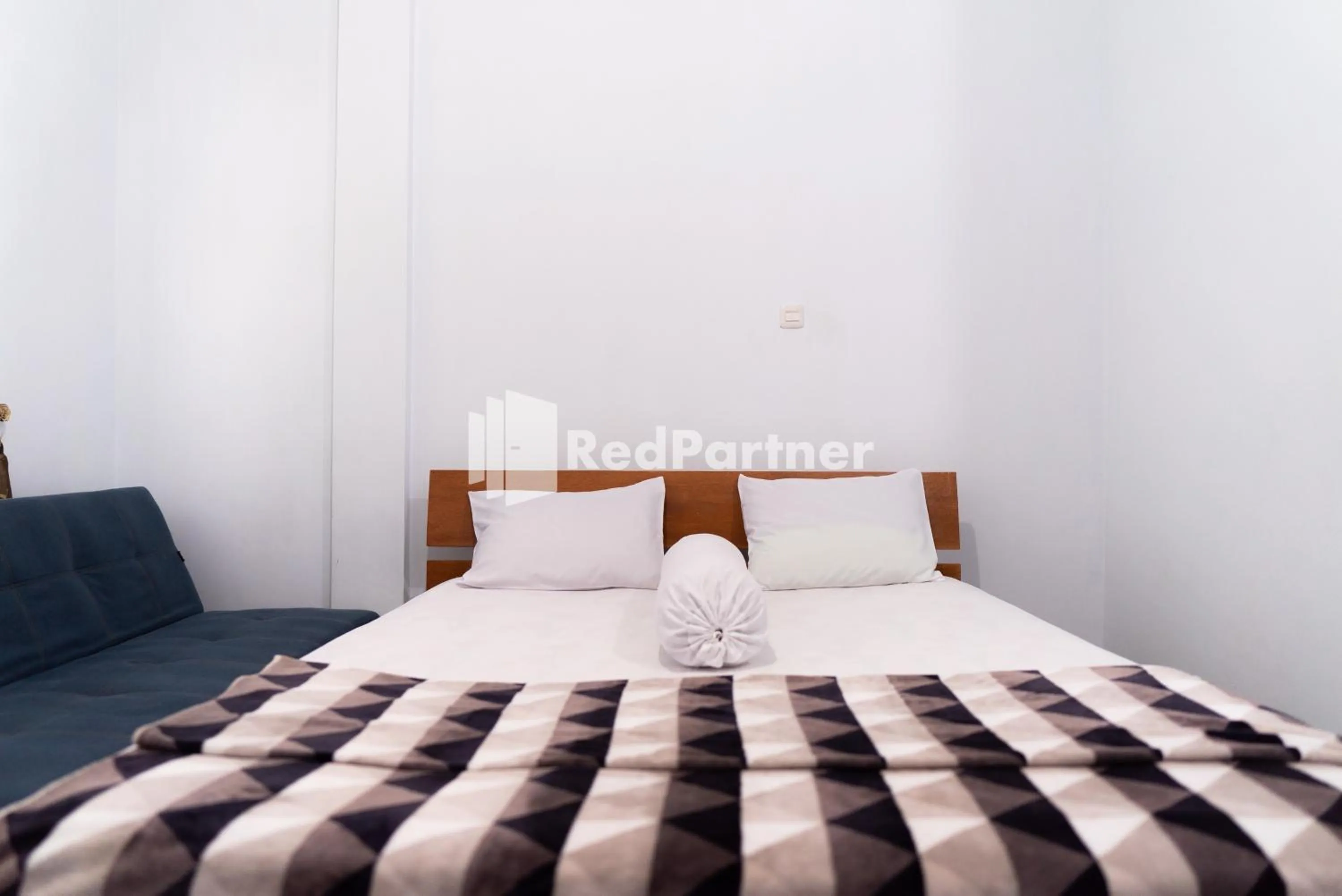 Bedroom in ITR Homestay RedPartner