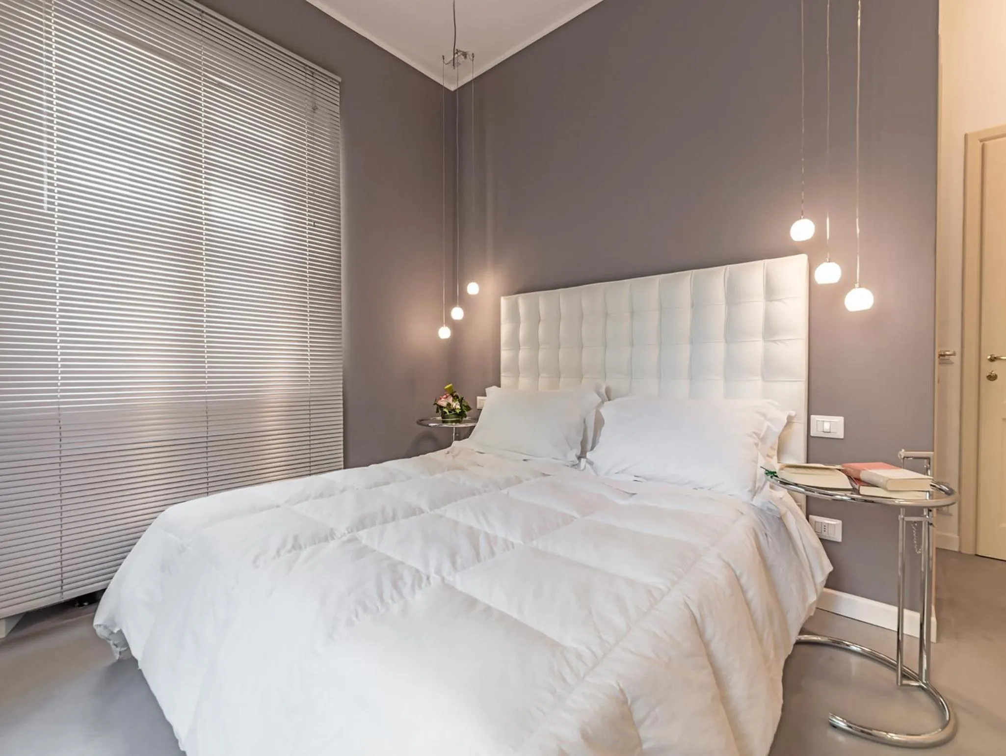 Decorative detail, Bed in Hotel Astro Mediceo