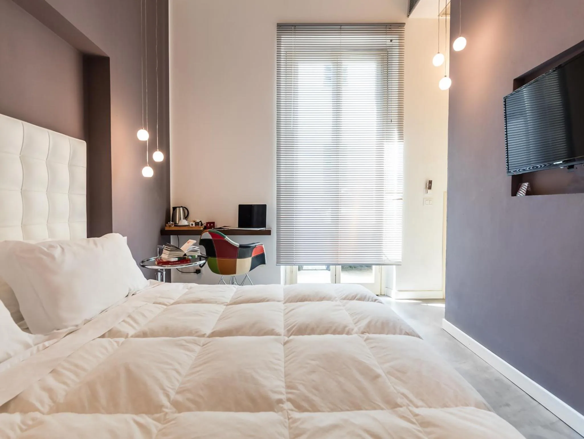 Decorative detail, Bed in Hotel Astro Mediceo