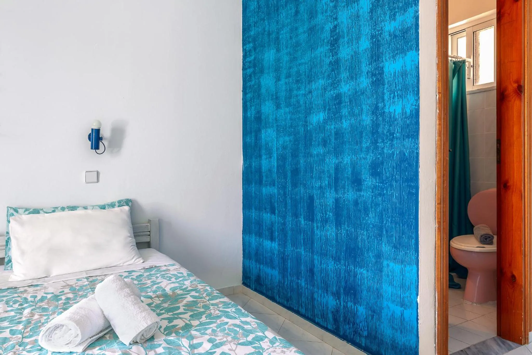 Bed in Antoniadi Rooms