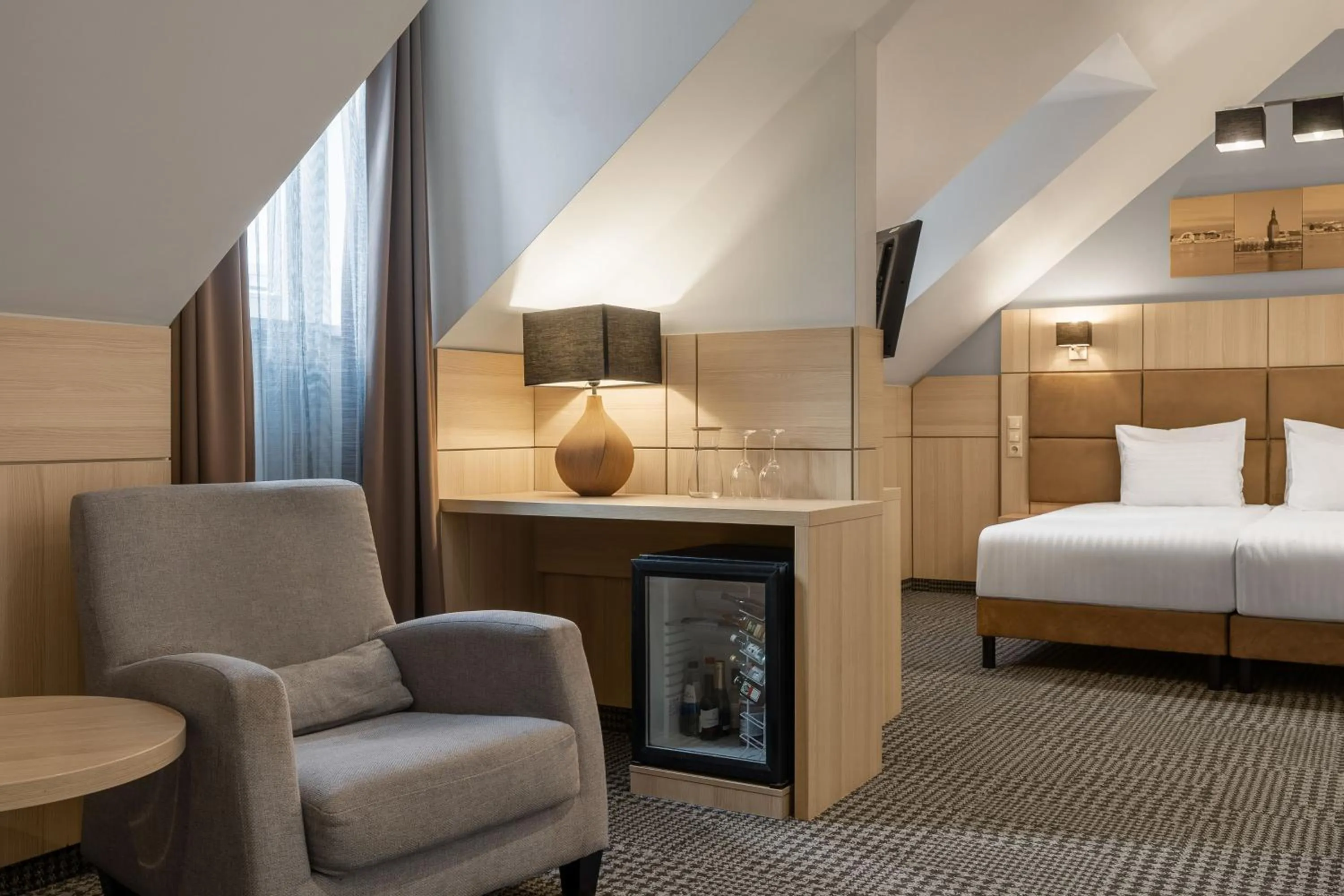 Seating area, Bed in Wellton Centrum Hotel & SPA