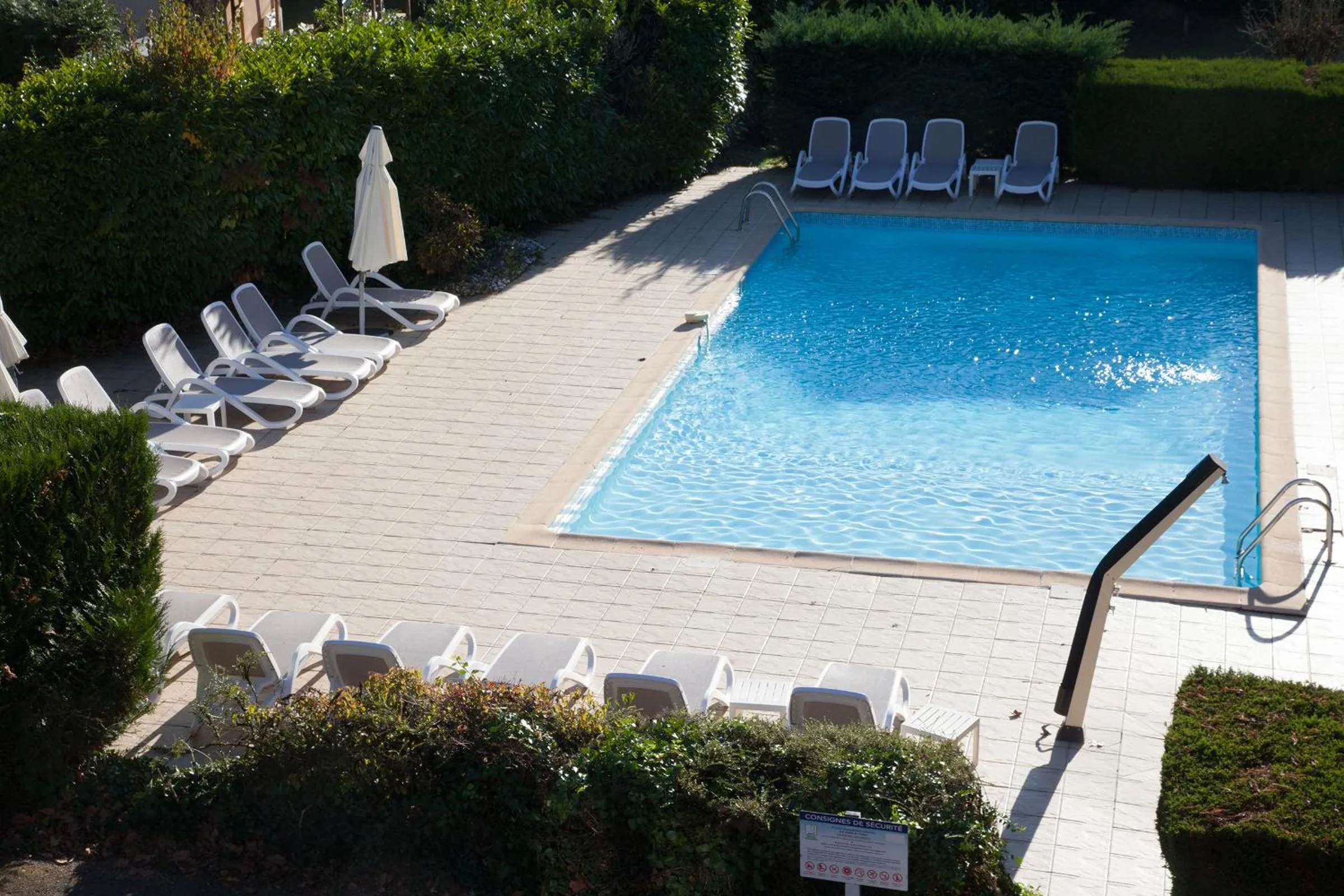 Pool view in Hôtel La Hoirie