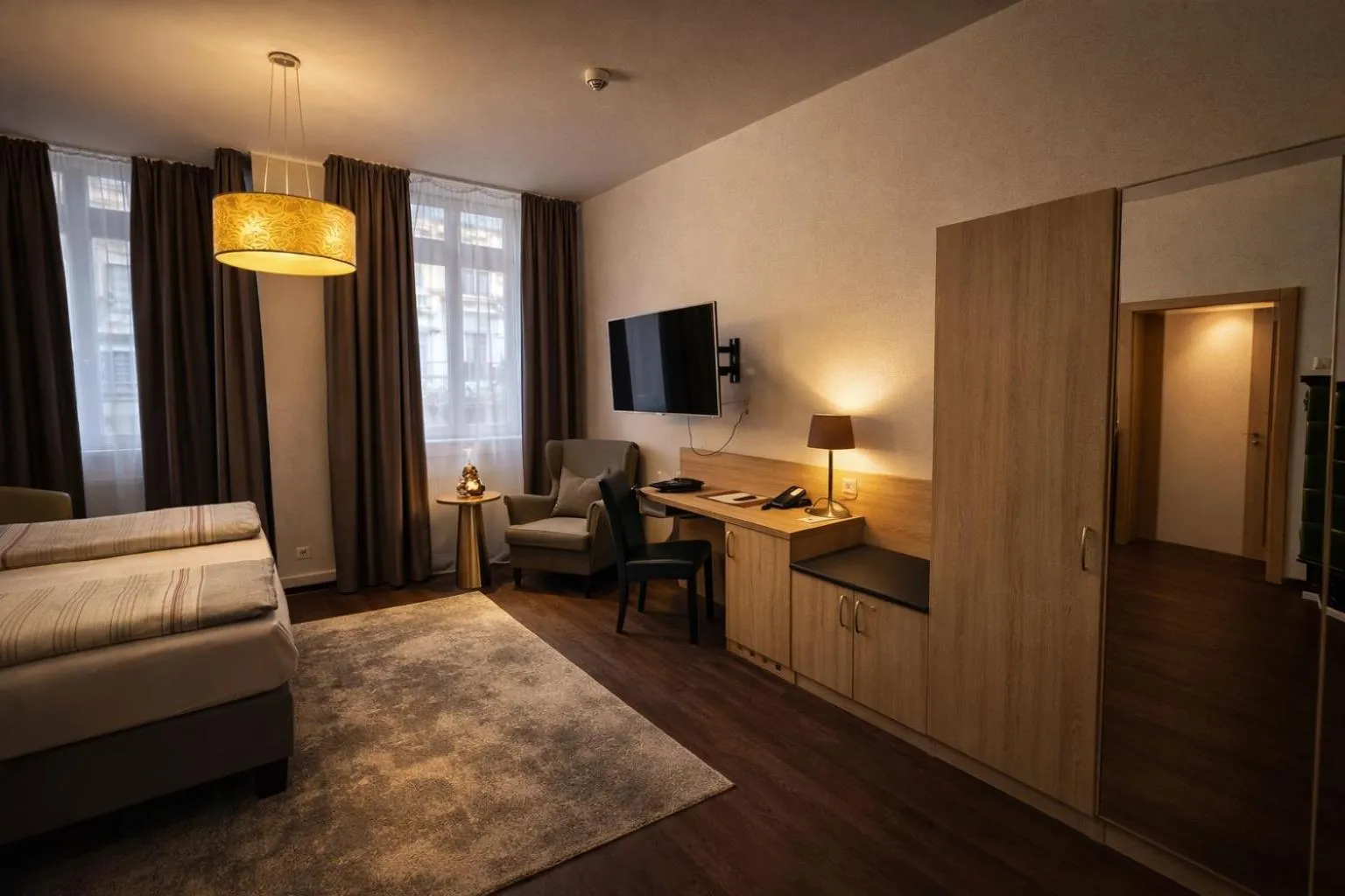 Photo of the whole room, Bed in Hotel Bayrischer Hof