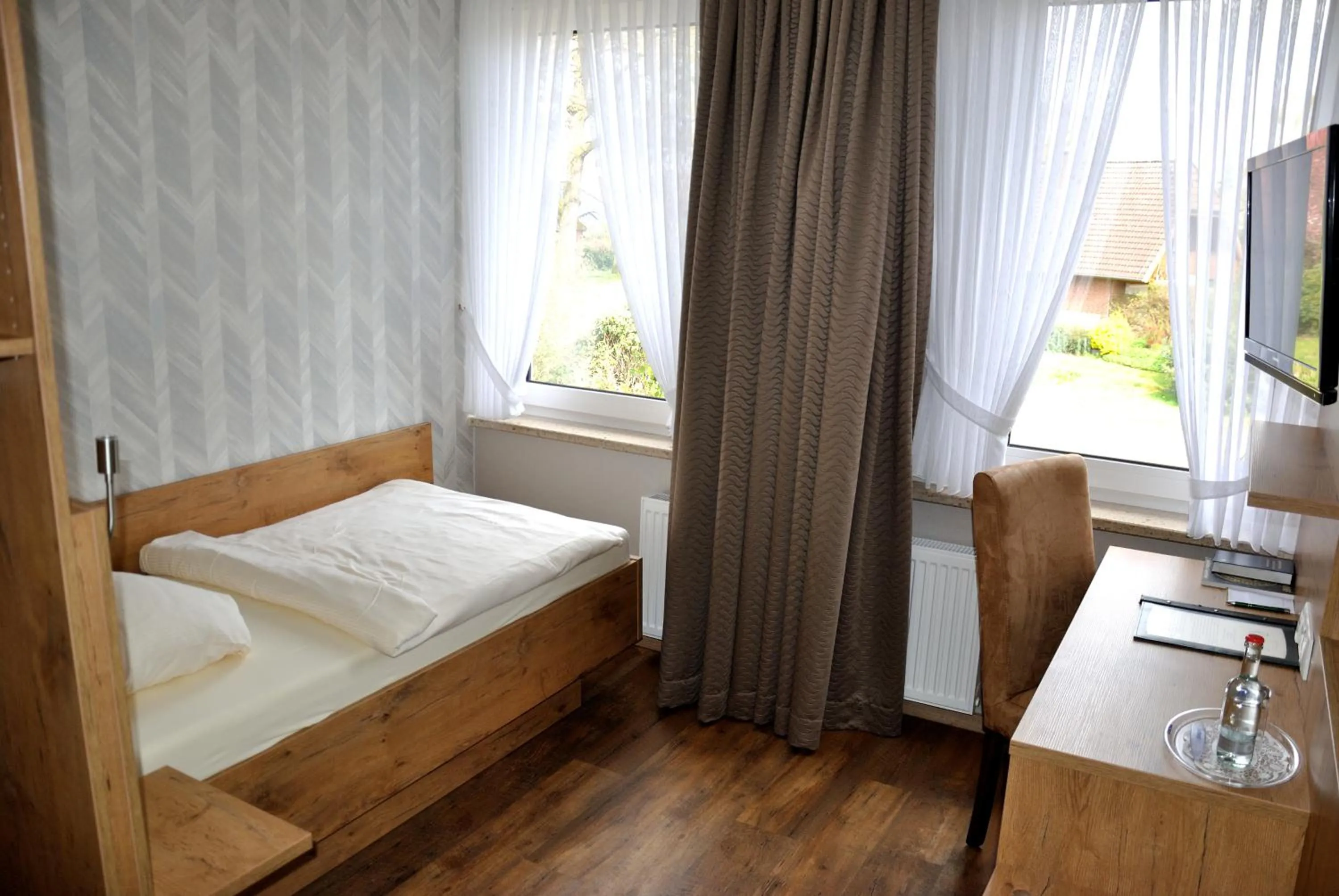 Bed in Gasthof Vossbur