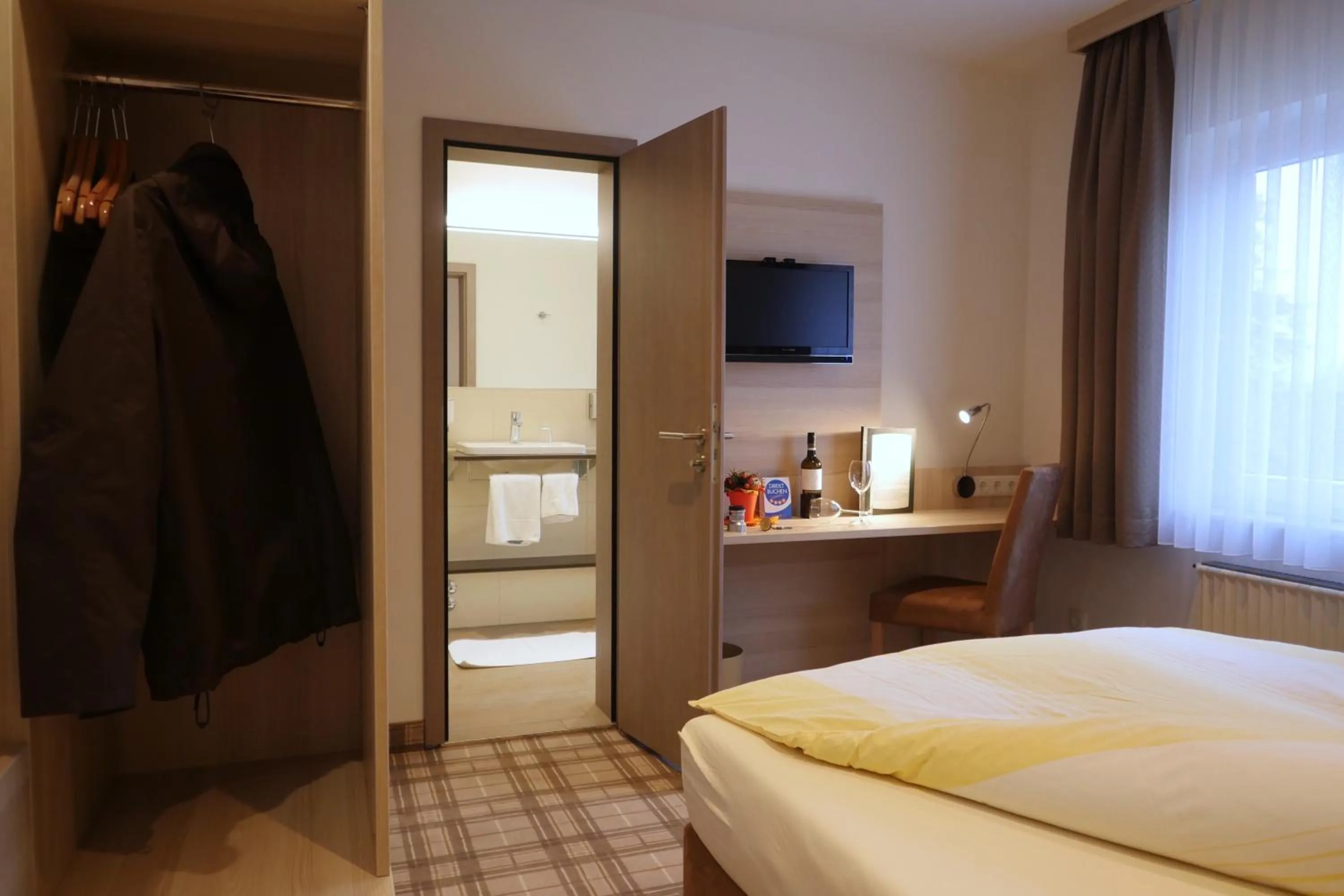 Bed in Gasthof Vossbur