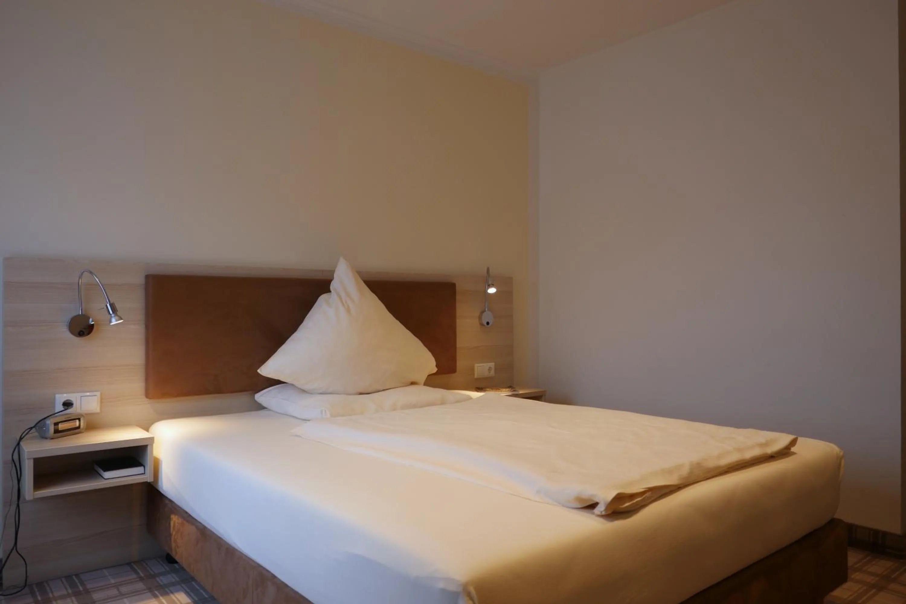 Bed in Gasthof Vossbur