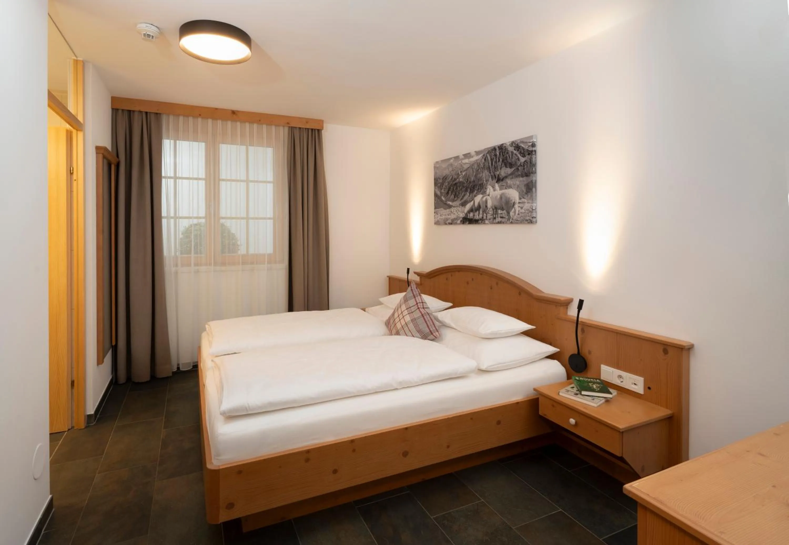 Bed in AlpinLodges Kühtai