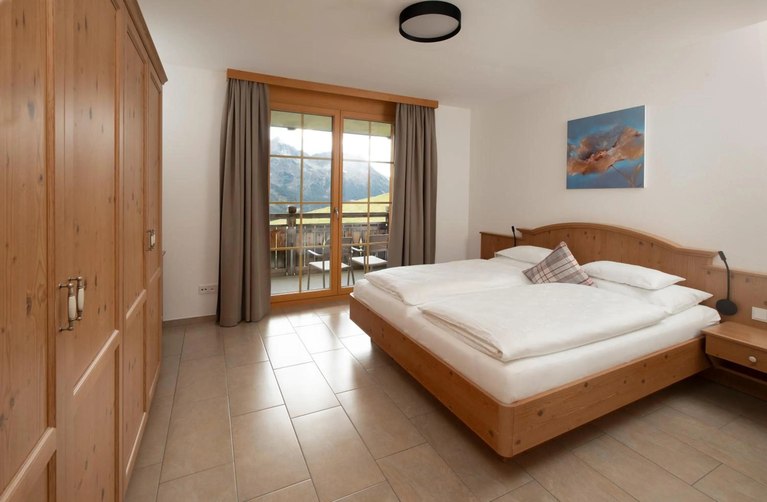 Bed in AlpinLodges Kühtai