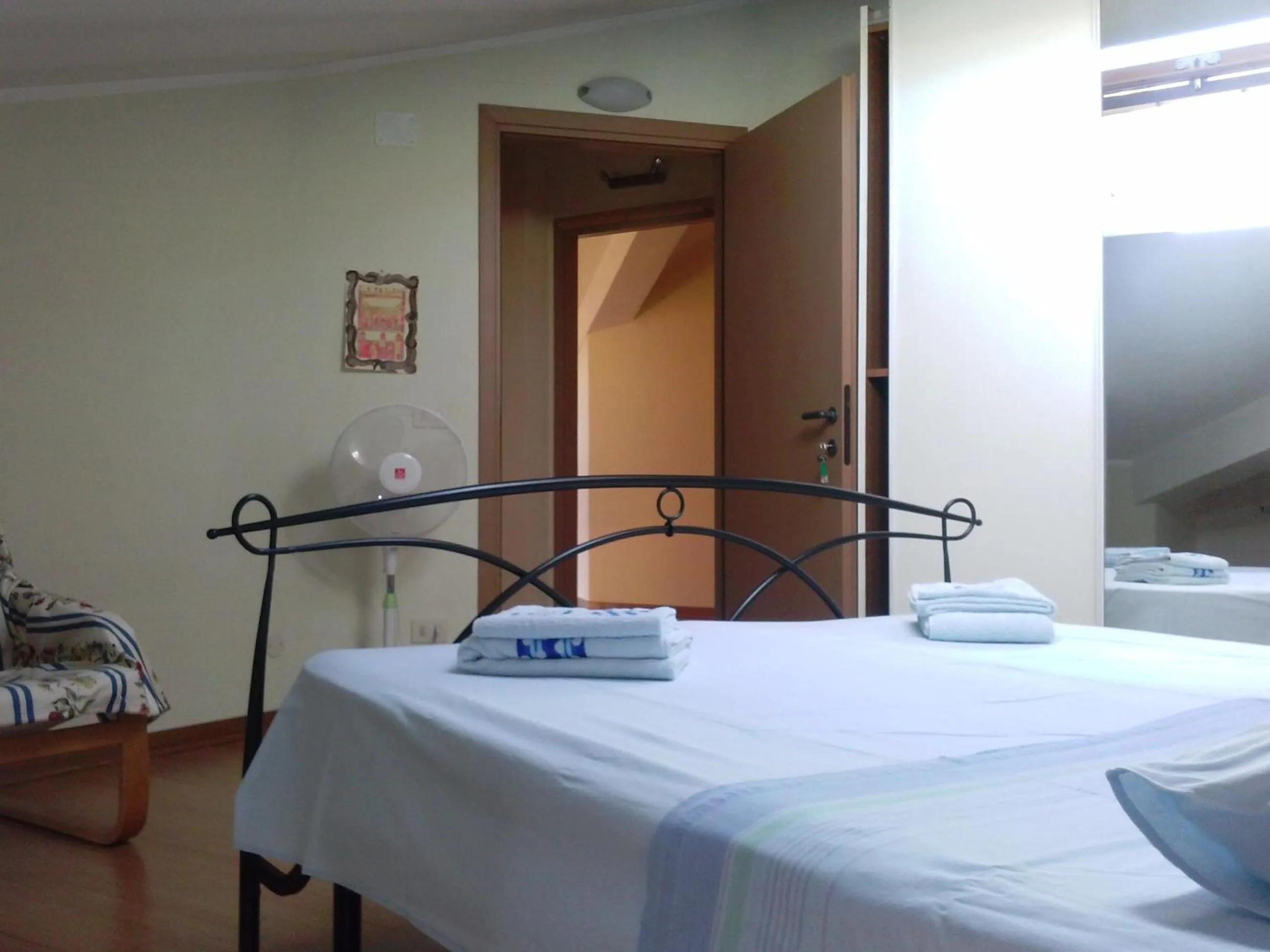 Photo of the whole room, Bed in Mansarda Raggio Di Sole