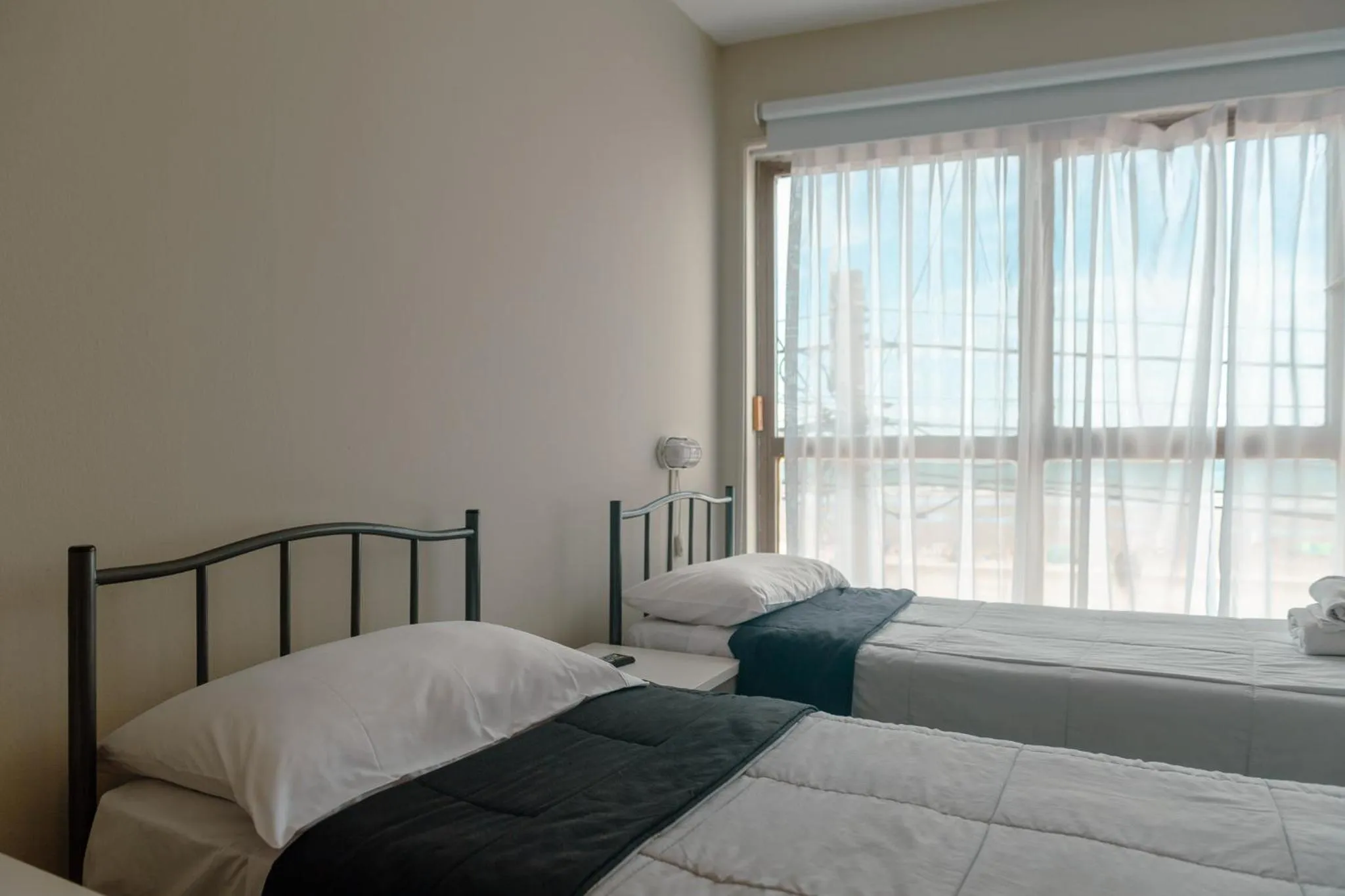 Bed in Rayentray Hostal