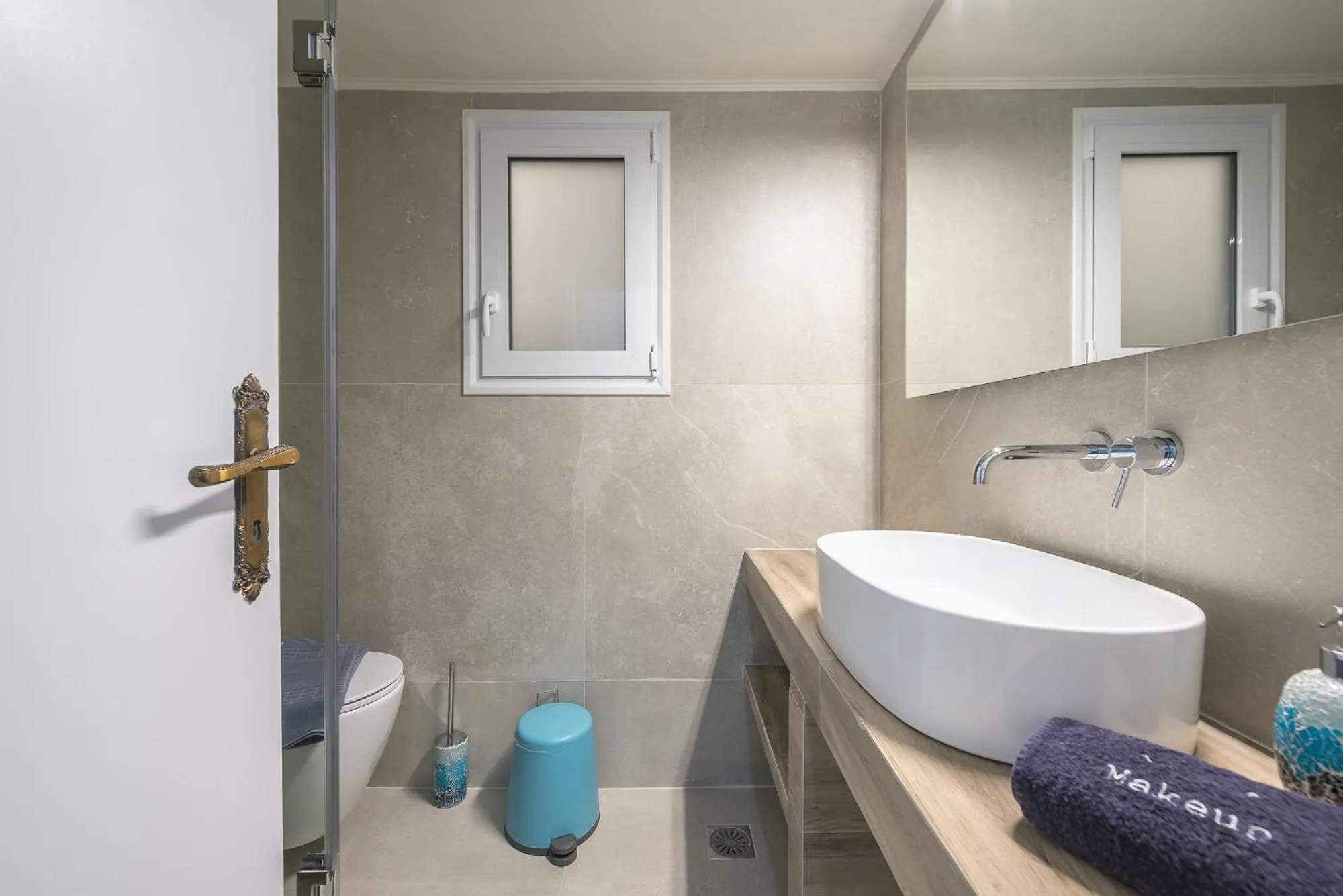 Bathroom in Athens Bright Suite by CloudKeys