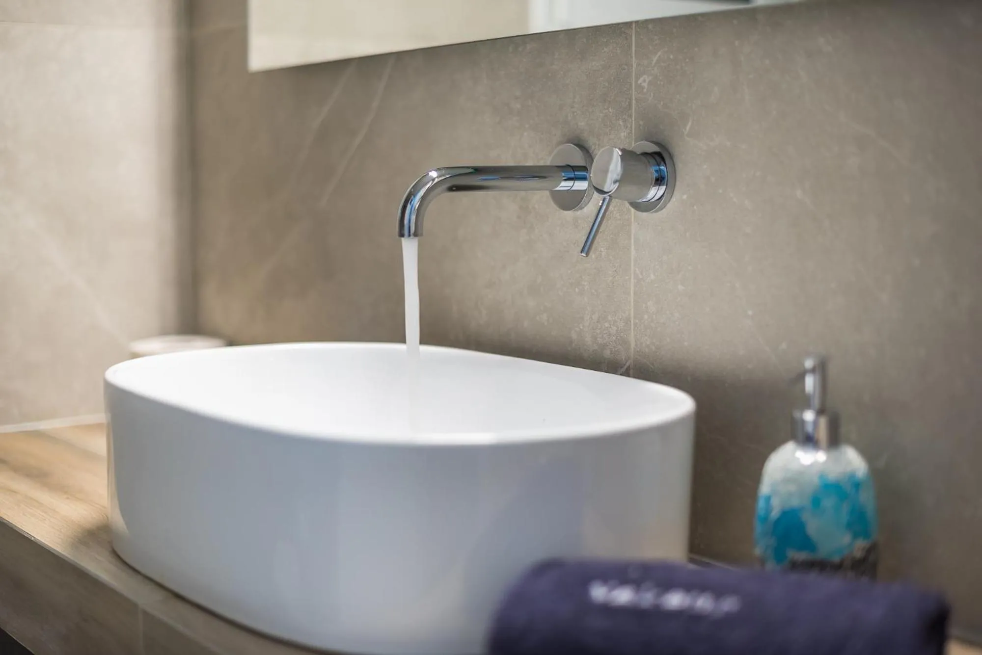 Bathroom in Athens Bright Suite by CloudKeys