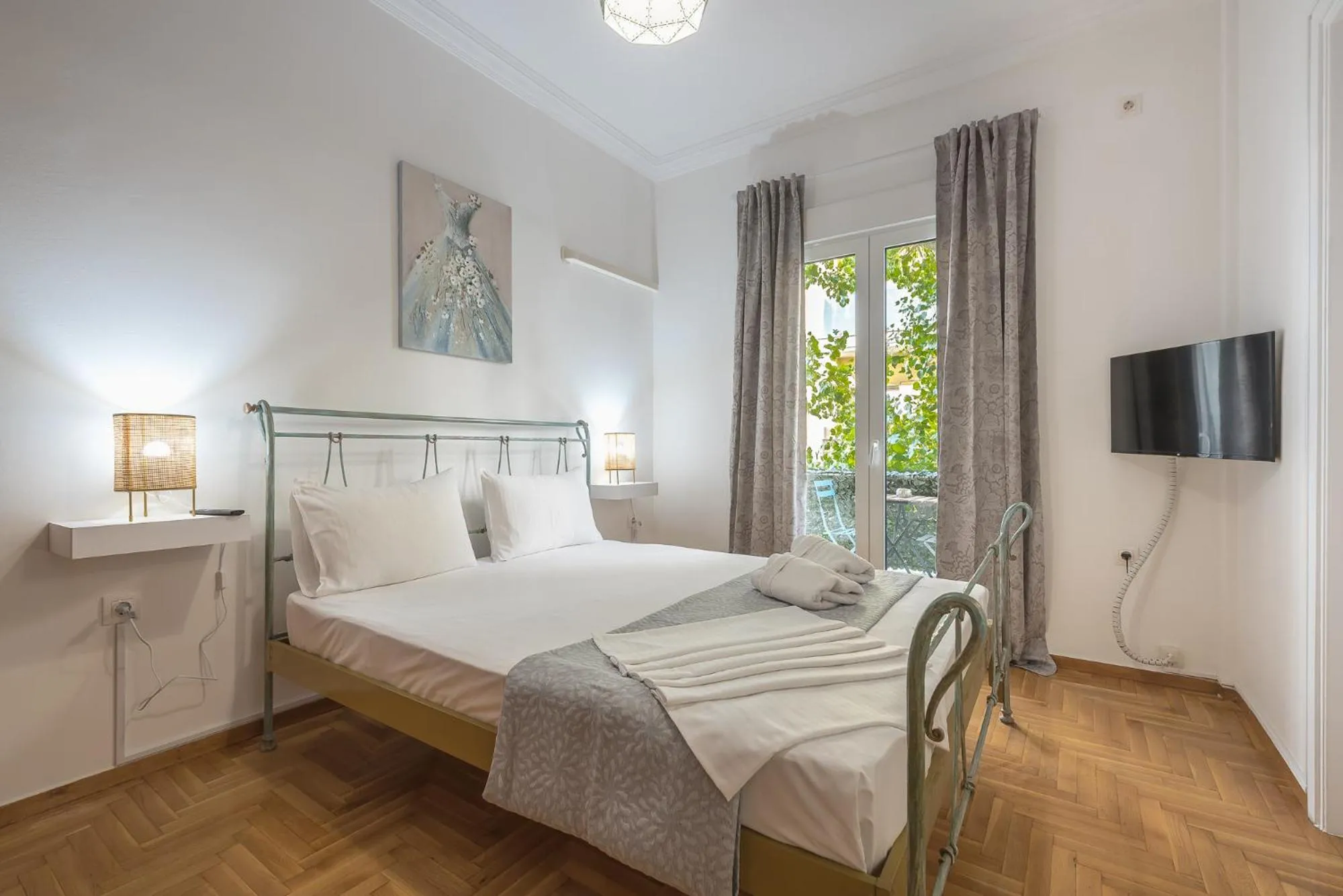 Bed in Athens Bright Suite by CloudKeys
