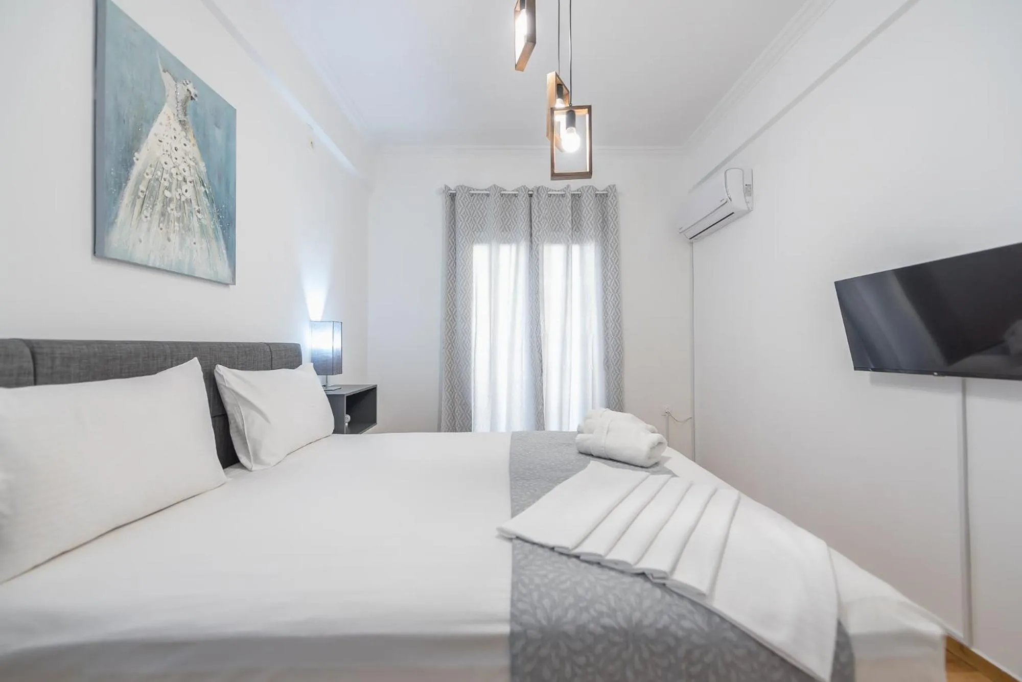 Bed in Athens Bright Suite by CloudKeys