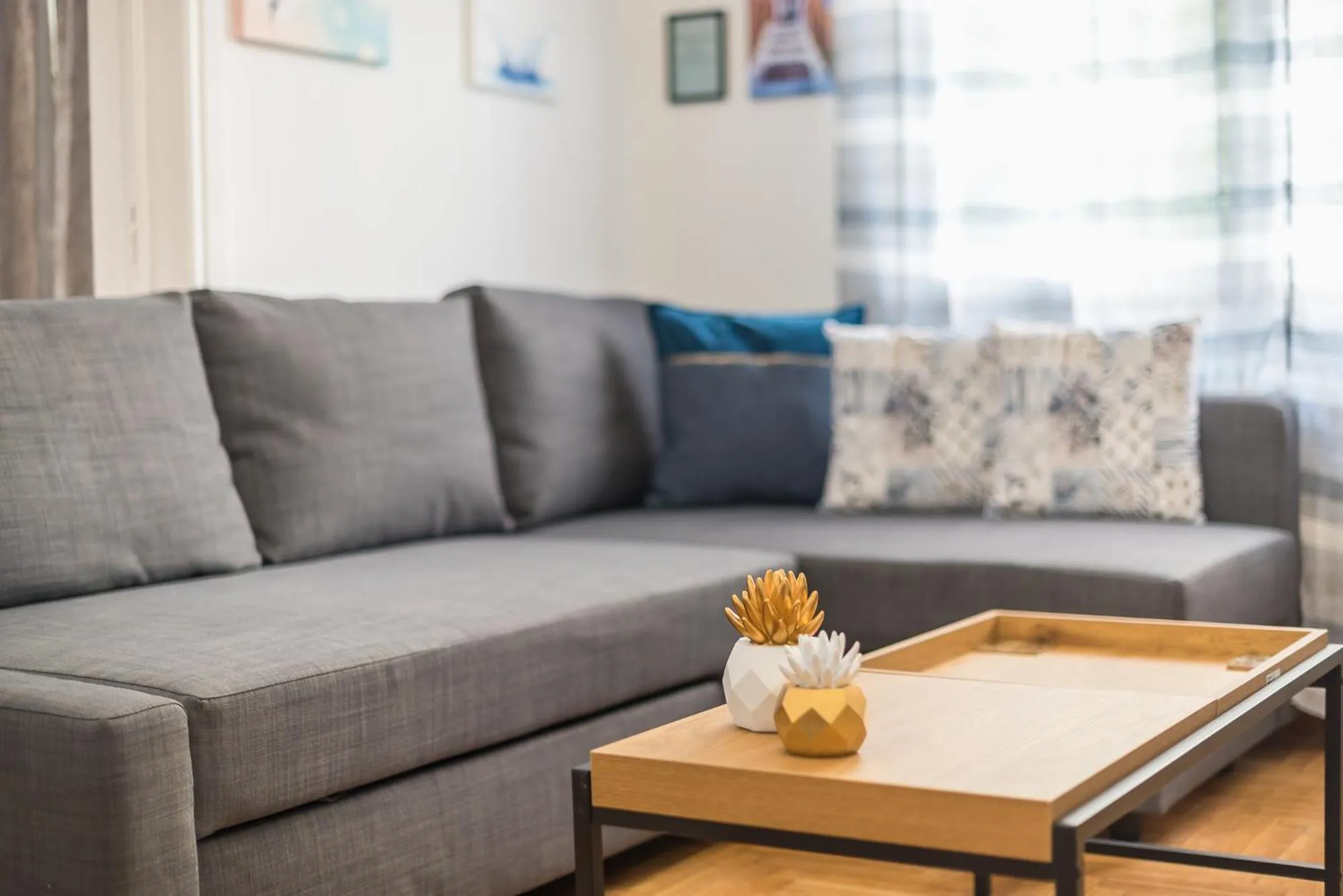 Living room in Athens Bright Suite by CloudKeys