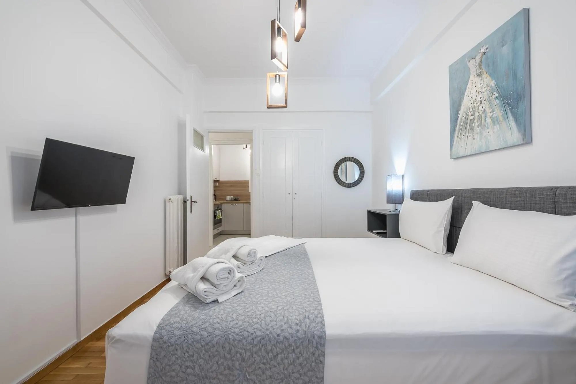 Bed in Athens Bright Suite by CloudKeys
