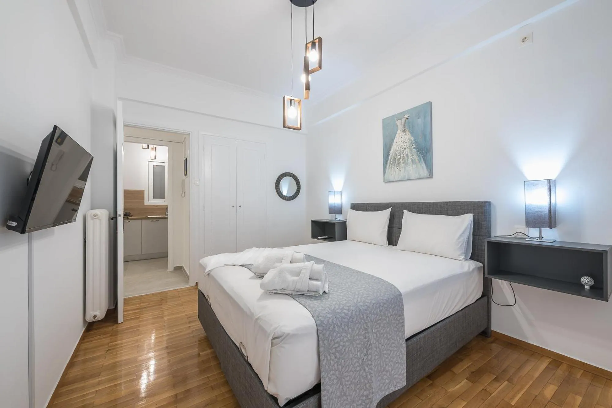 Bed in Athens Bright Suite by CloudKeys