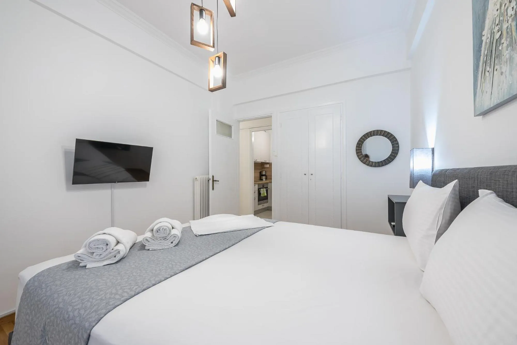Bed in Athens Bright Suite by CloudKeys