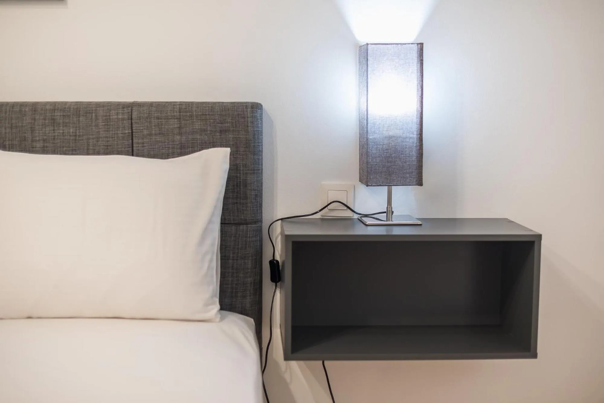 Bed in Athens Bright Suite by CloudKeys