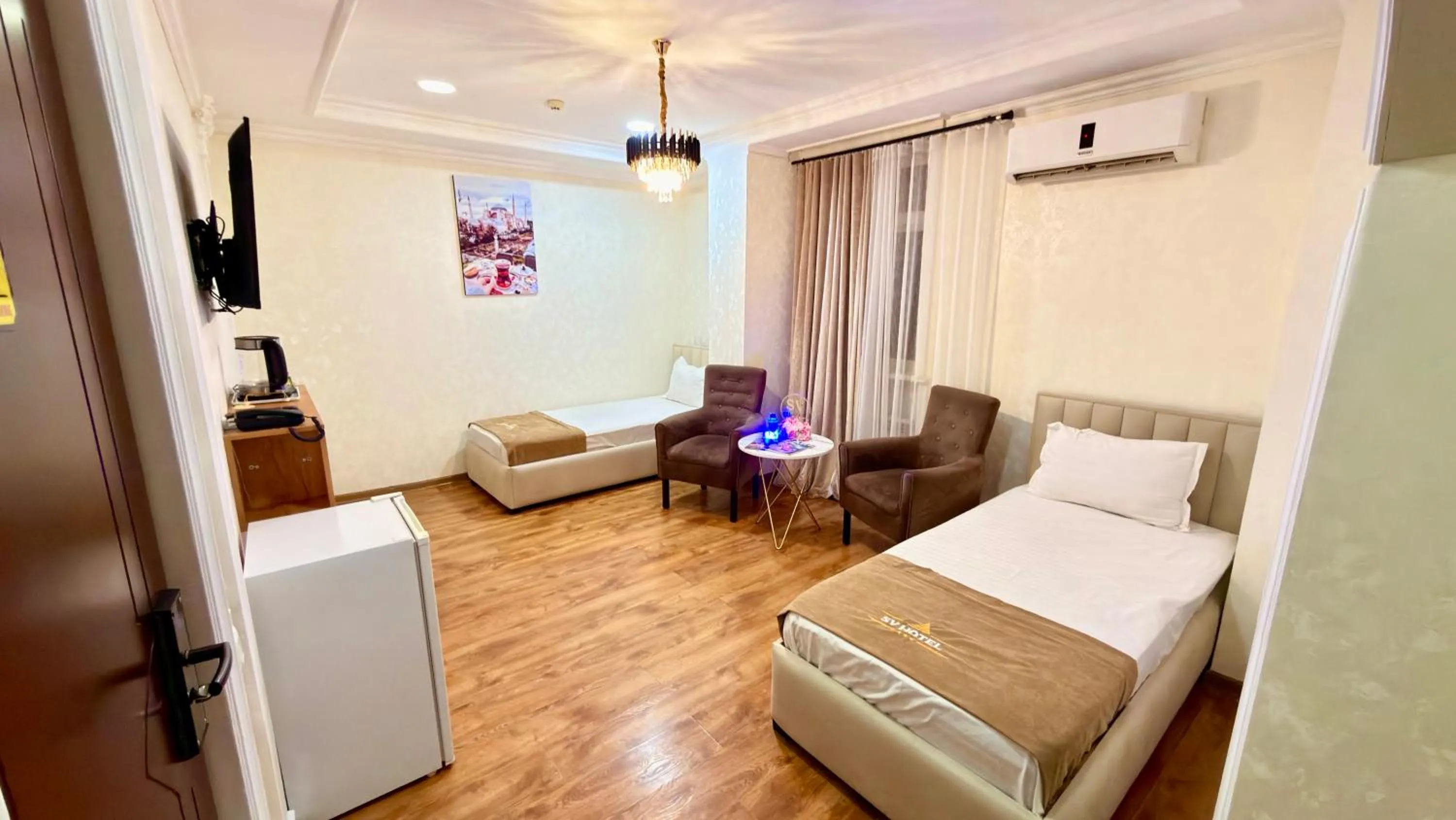 Communal lounge/ TV room, Bed in SV HOTEL Tashkent