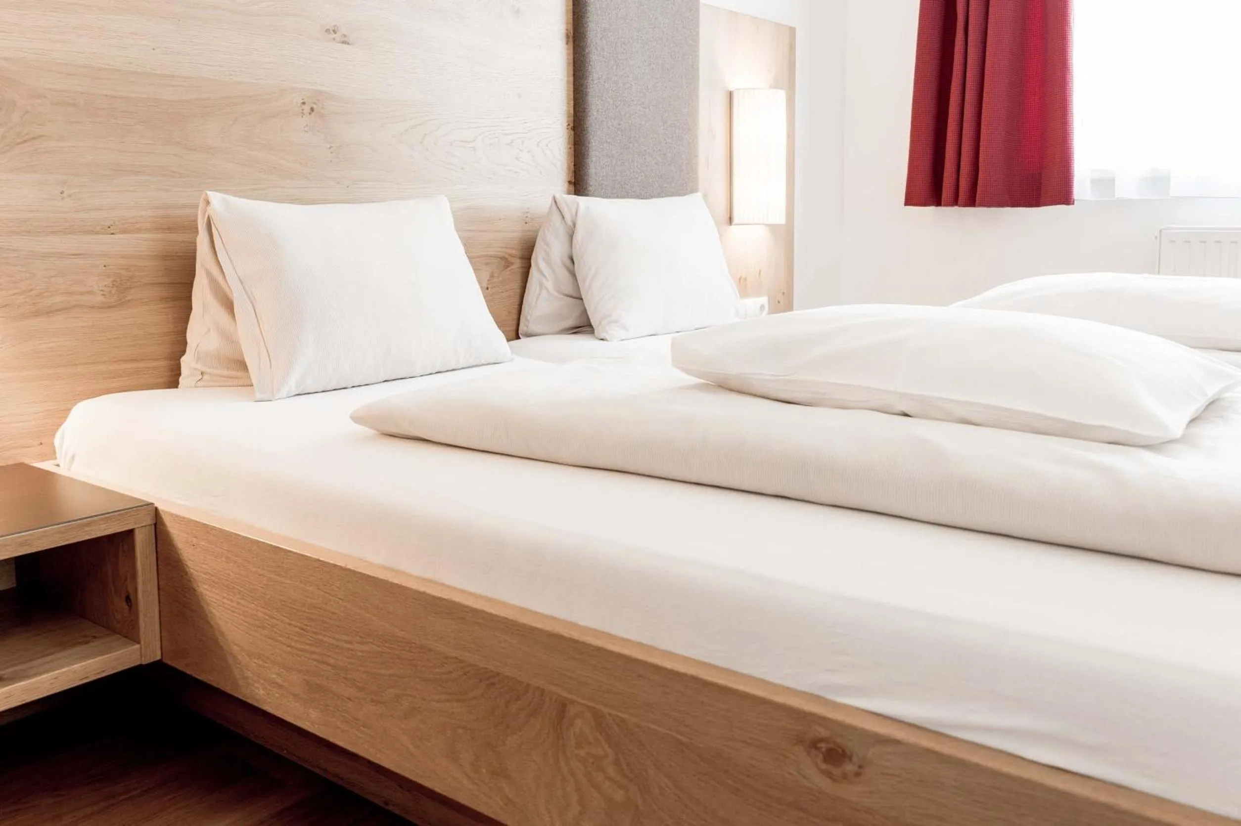 Bed in Die Barbara Appartements & Zimmer