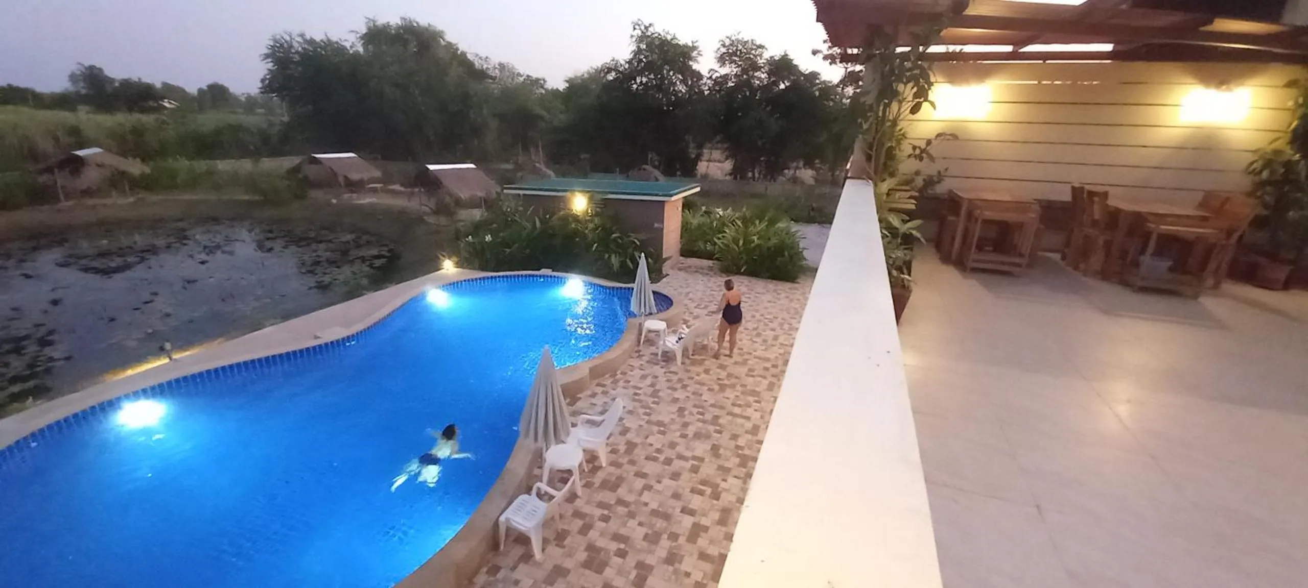 Swimming pool in Bua Daeng Homestay Resort