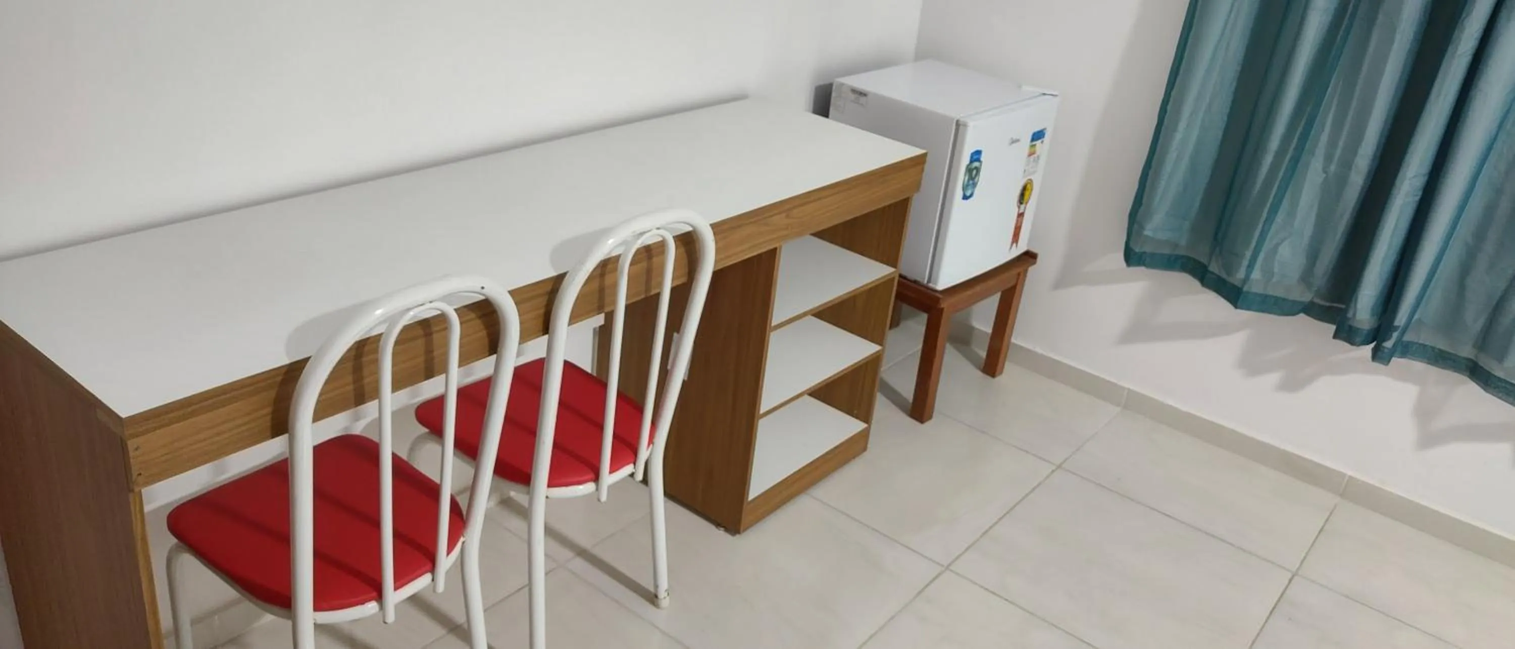 Bed in Hotel Jardim Tropical