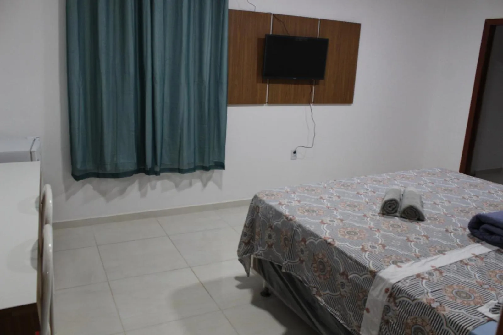 Bed in Hotel Jardim Tropical