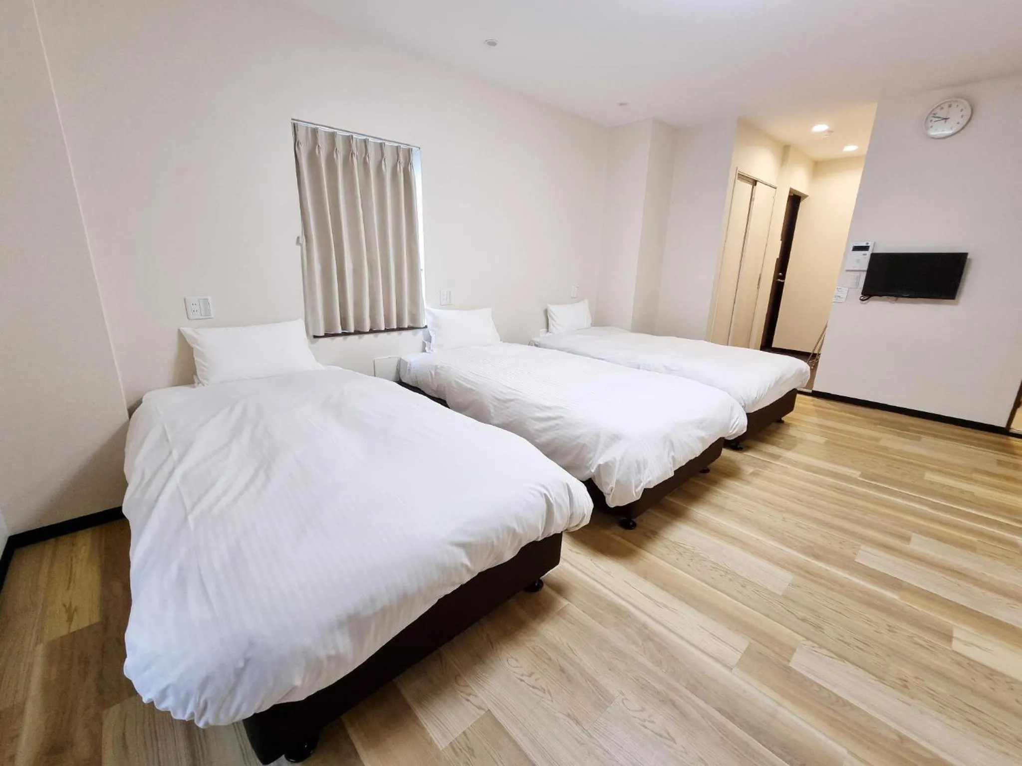 Photo of the whole room, Bed in KYU KYU HOTEL