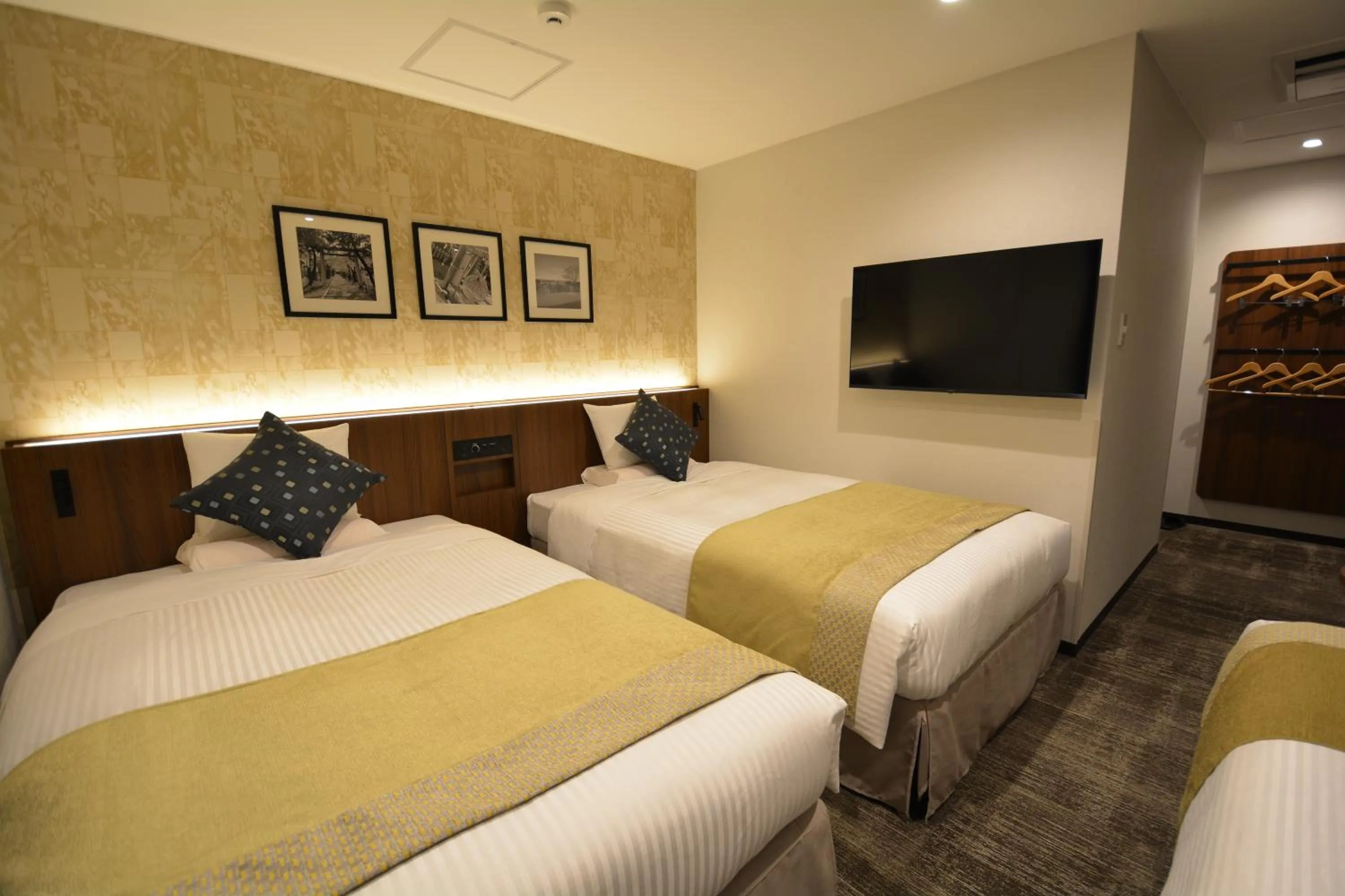 Bed in HOTEL MYSTAYS Hakodate Station