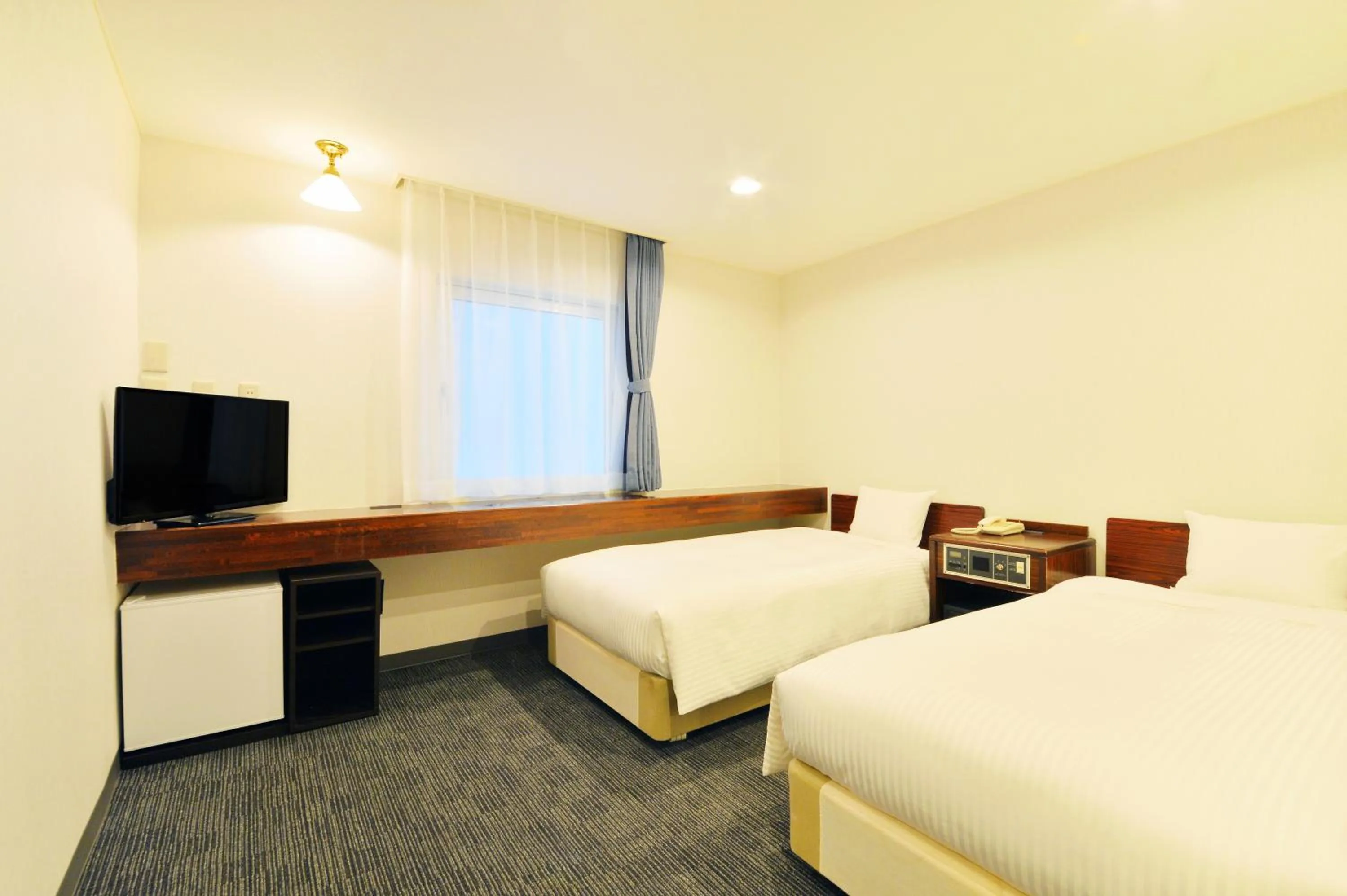 Bed in Smile Hotel Hakodate