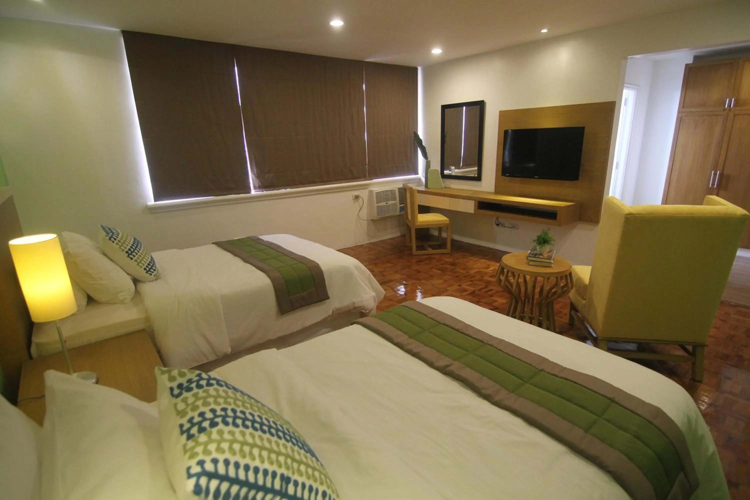 Bed in Bryan Condo Suites Makati near Airport
