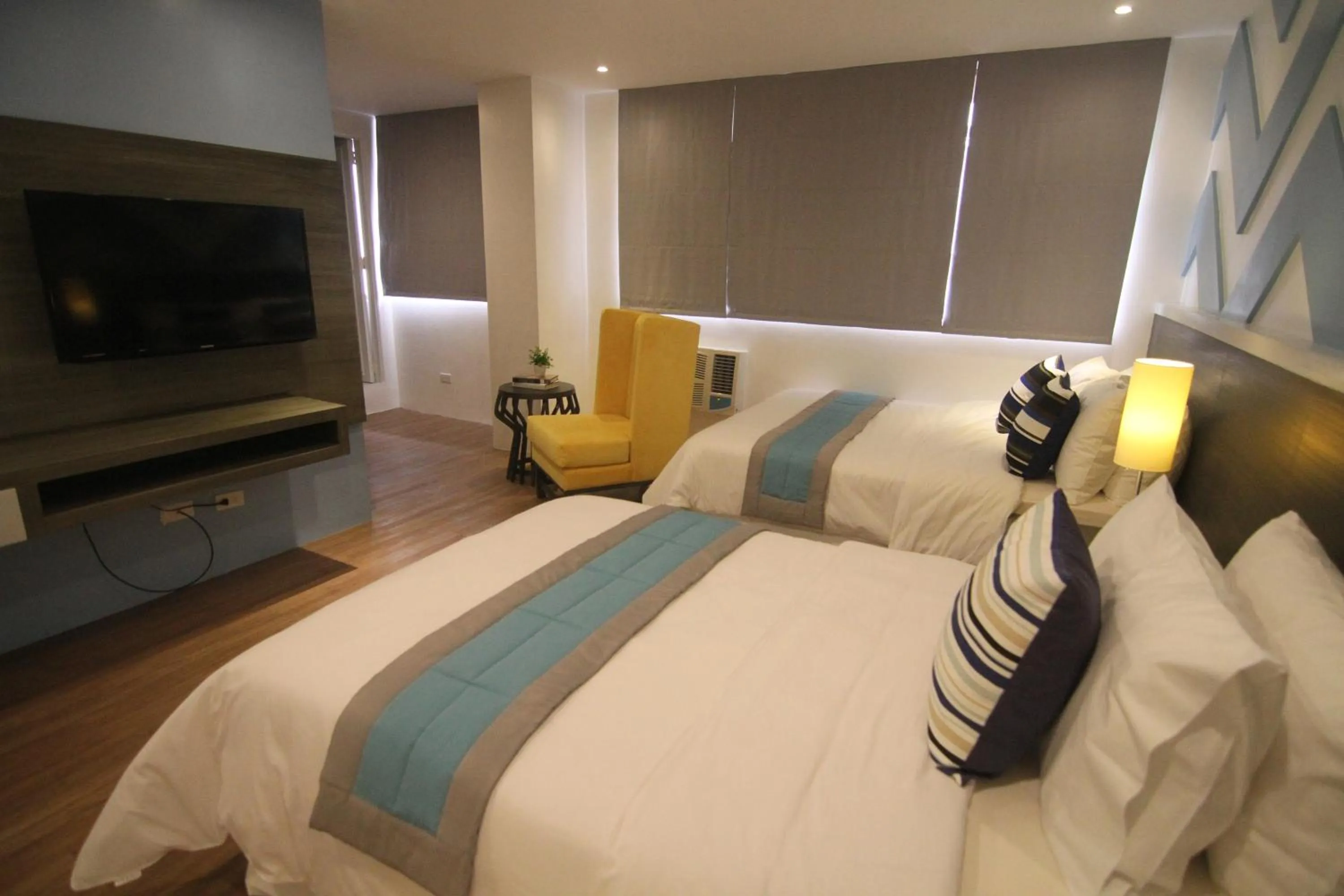 Bed in Bryan Condo Suites Makati near Airport