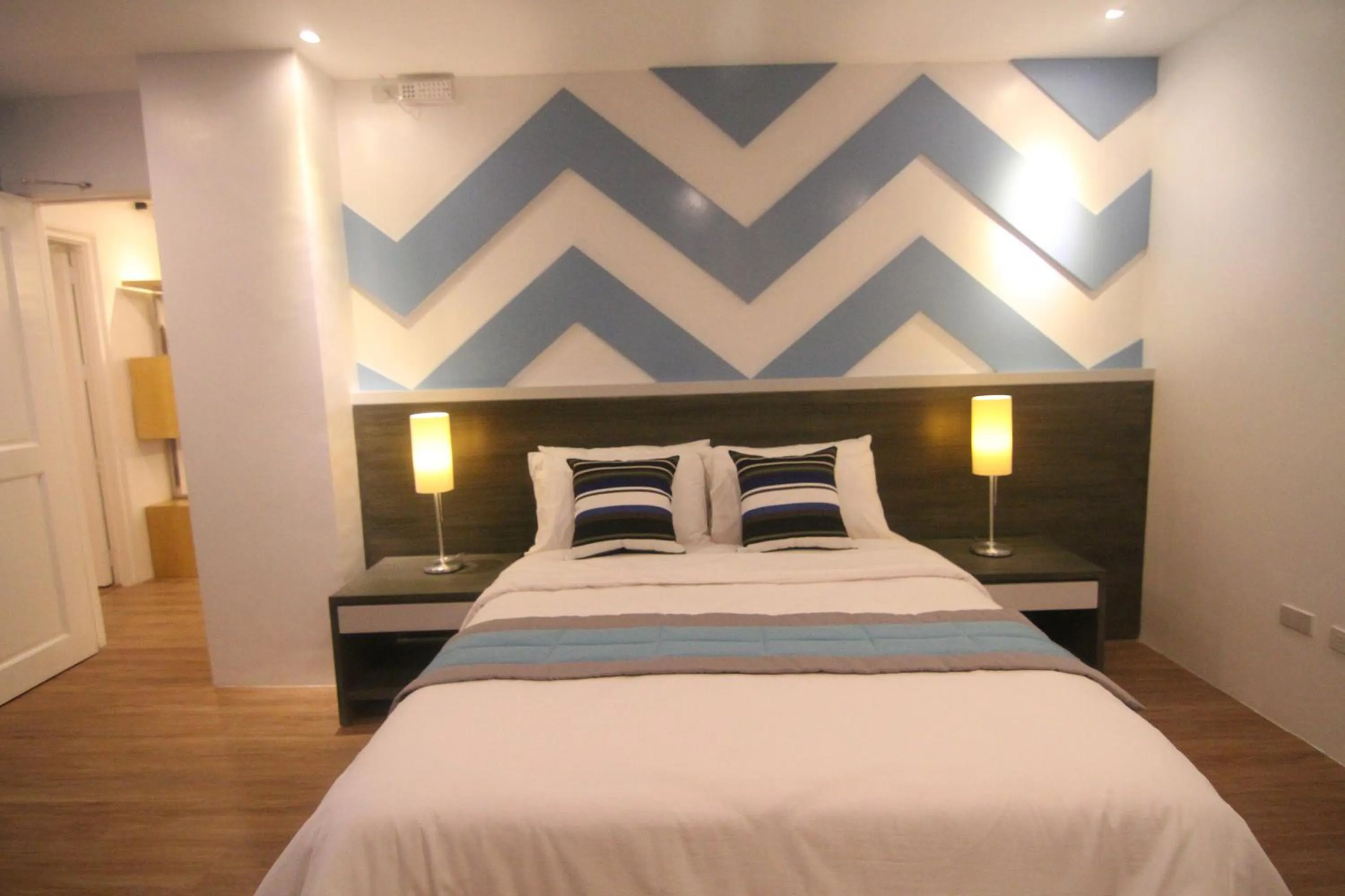 Bed in Bryan Condo Suites Makati near Airport
